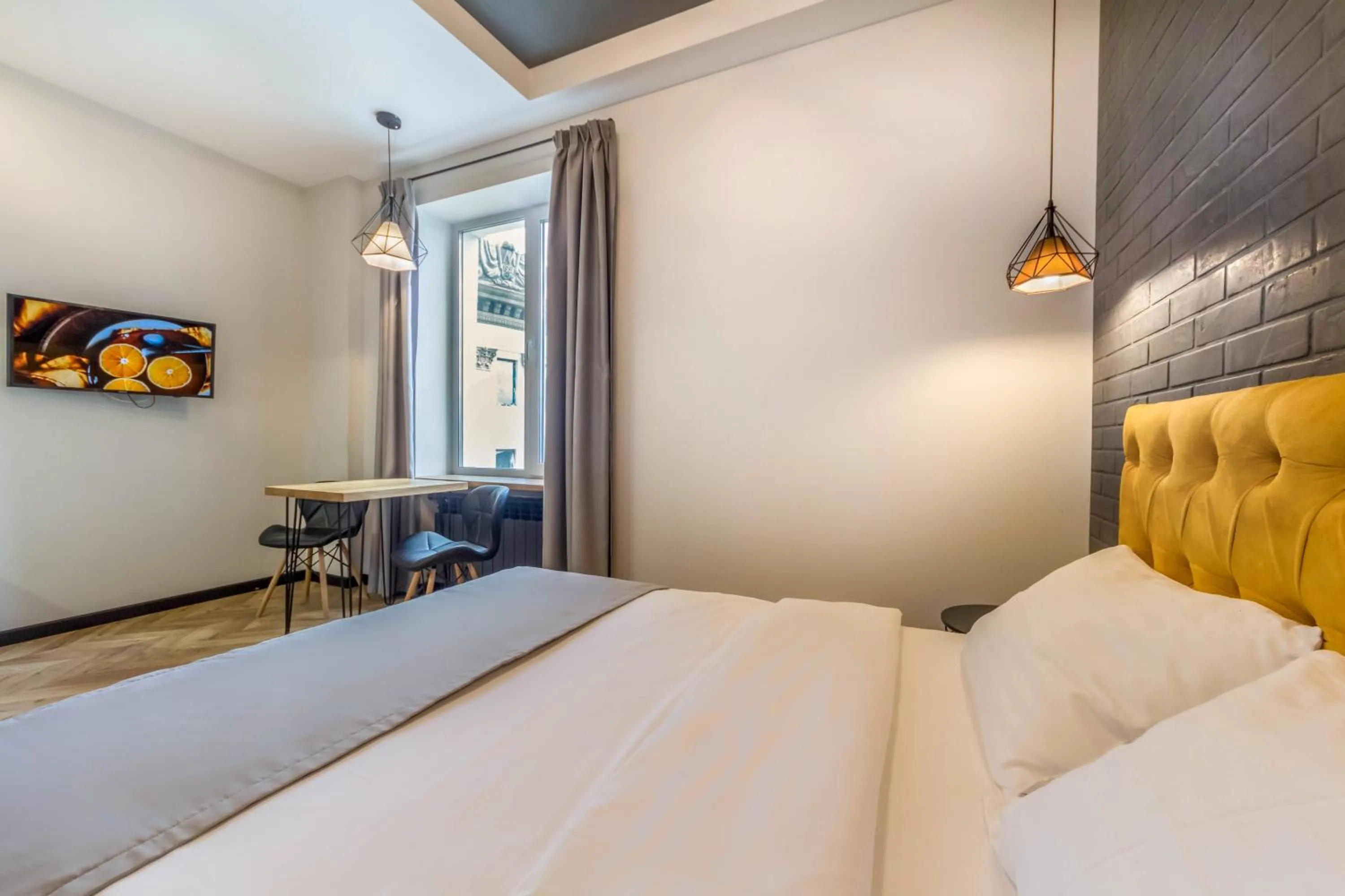 Bed in Idea Design Apart-Hotel Prorizna