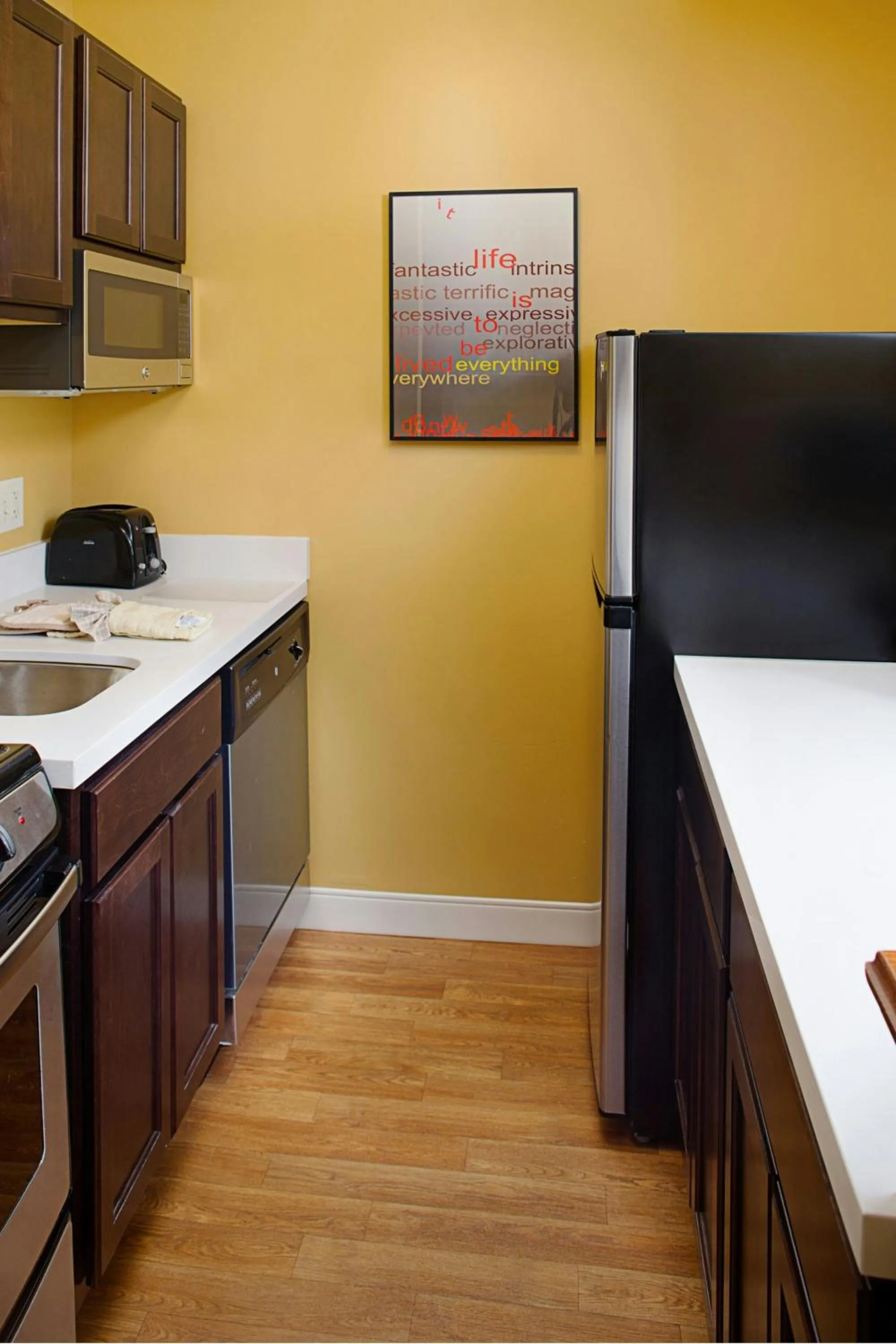 Kitchen or kitchenette in TownePlace Suites Manchester-Boston Regional Airport