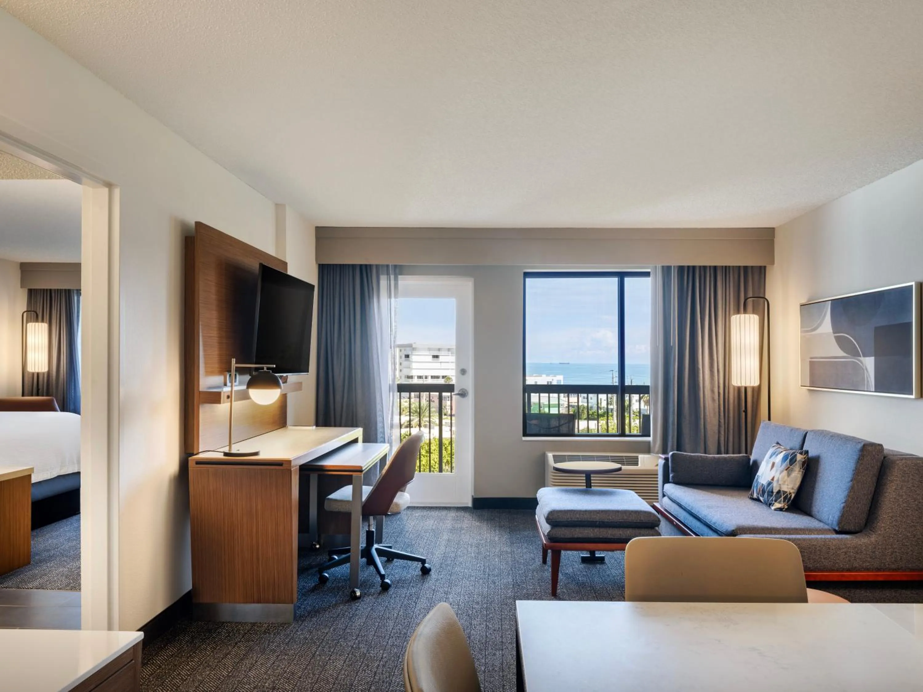 Living room, Bed in Courtyard by Marriott Cocoa Beach Cape Canaveral