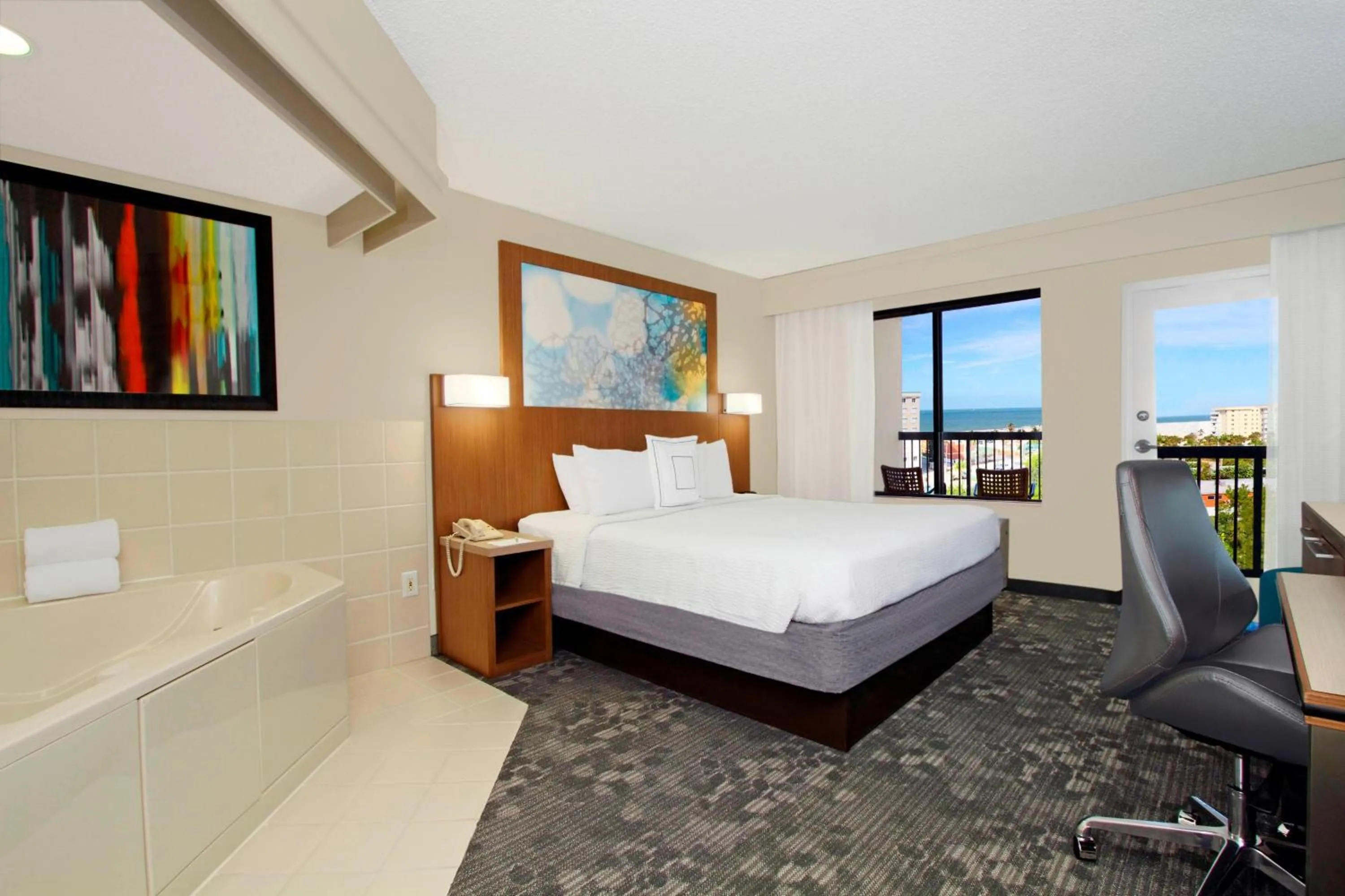 King Room with Spa Bath and Balcony in Courtyard by Marriott Cocoa Beach Cape Canaveral