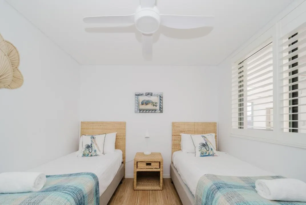 Bed in Bay Royal Apartments