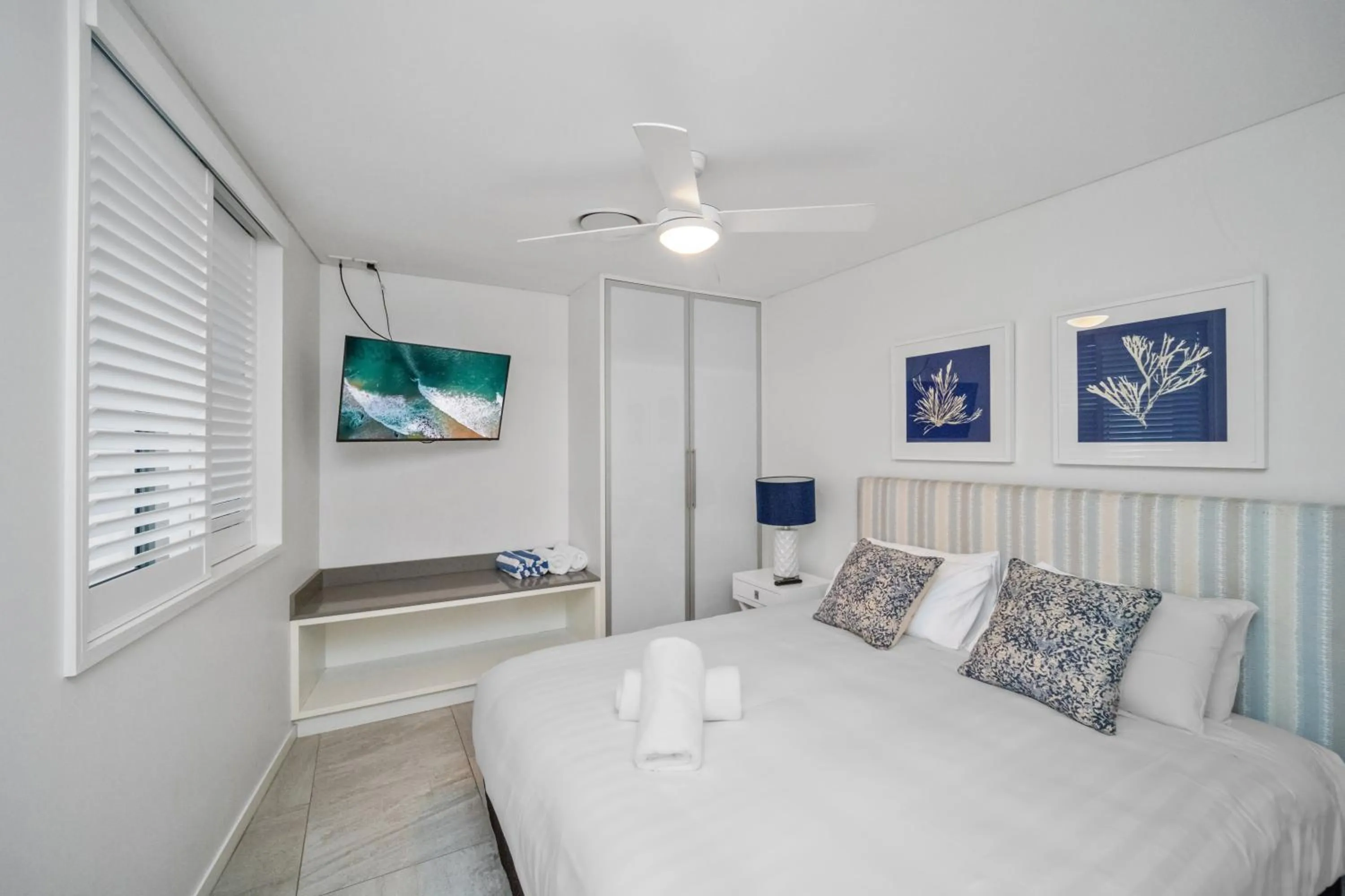 Bed in Bay Royal Apartments