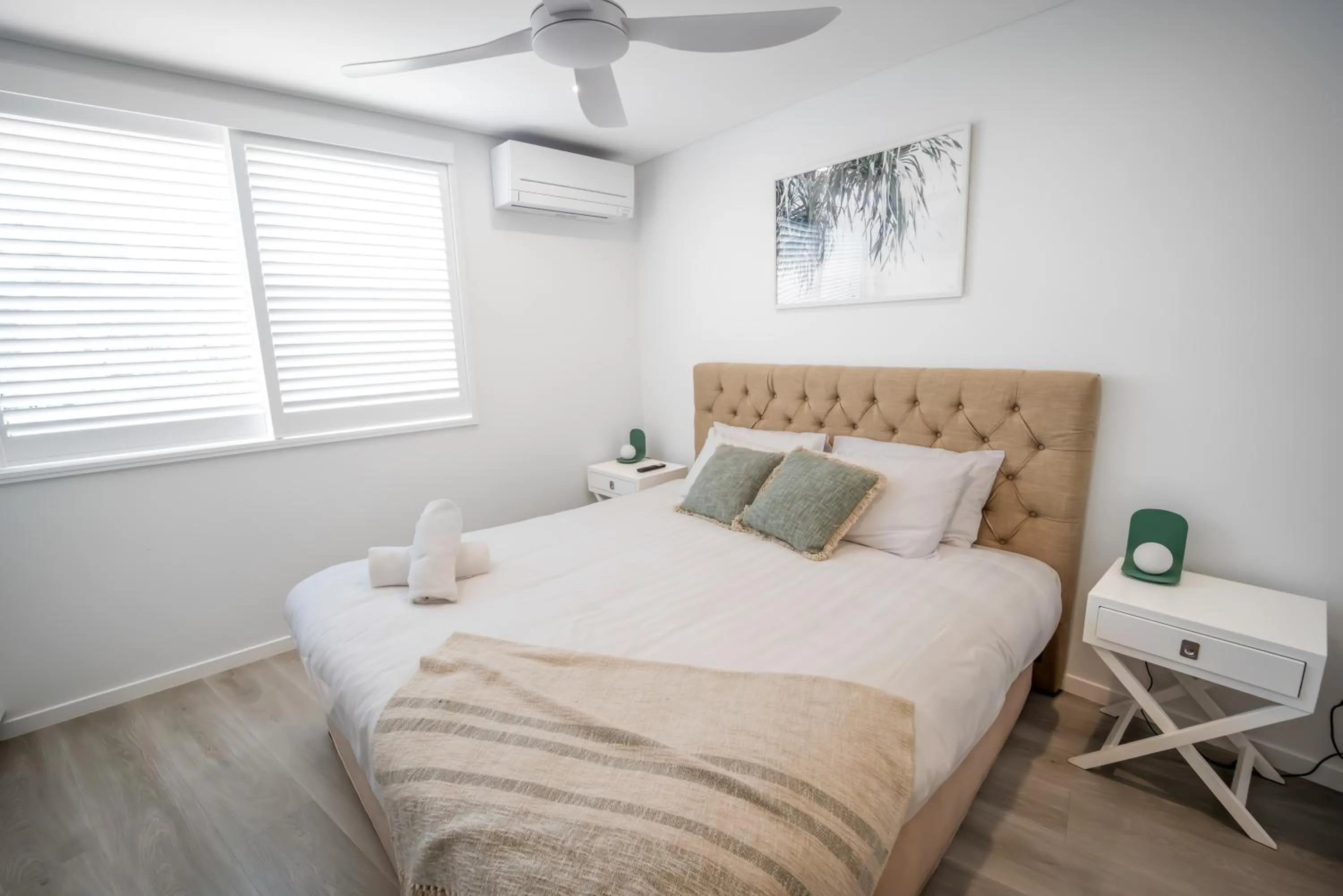 Bed in Bay Royal Apartments