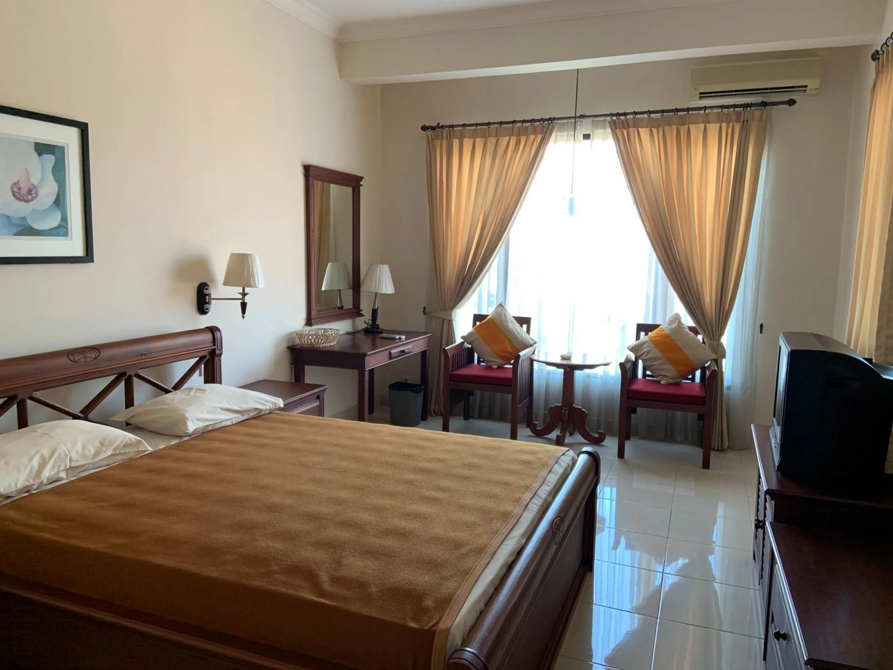 Photo of the whole room, Bed in Nirwana Suites