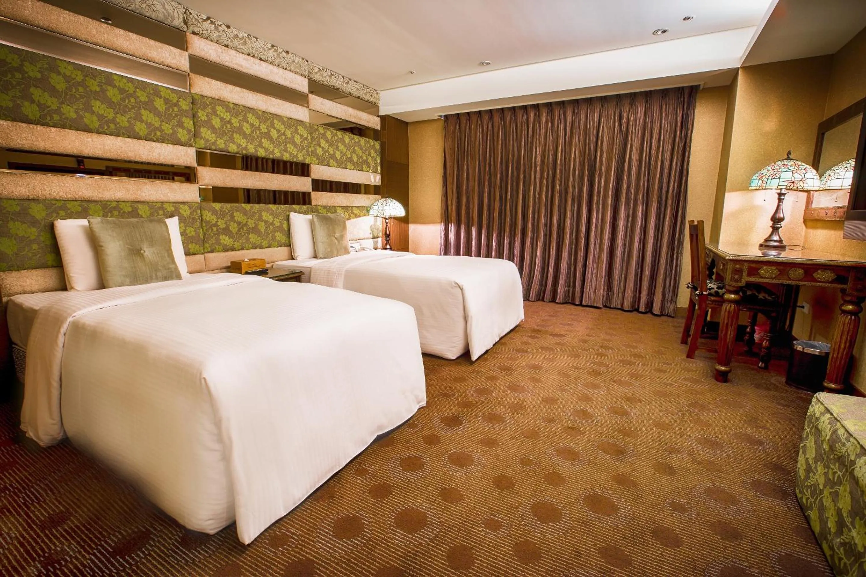 Bed in Cai She Hotel