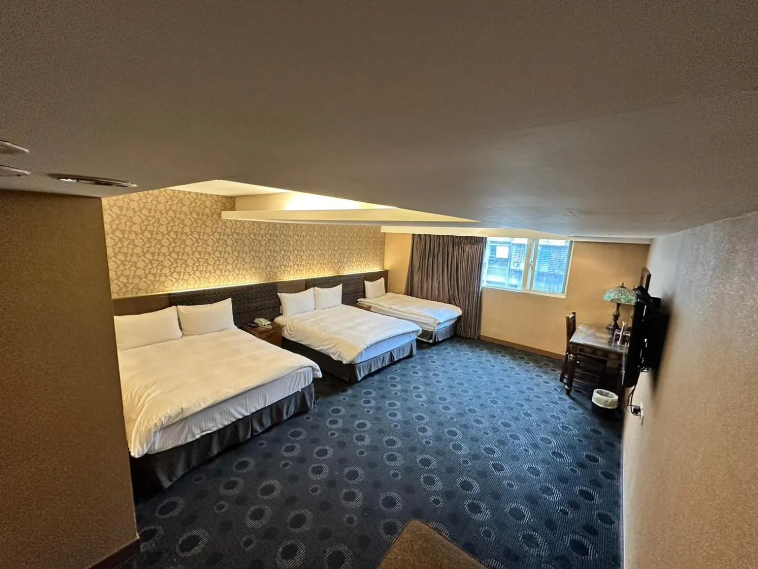 Bed in Cai She Hotel