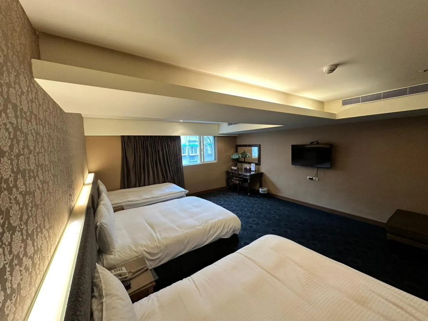 Bed in Cai She Hotel