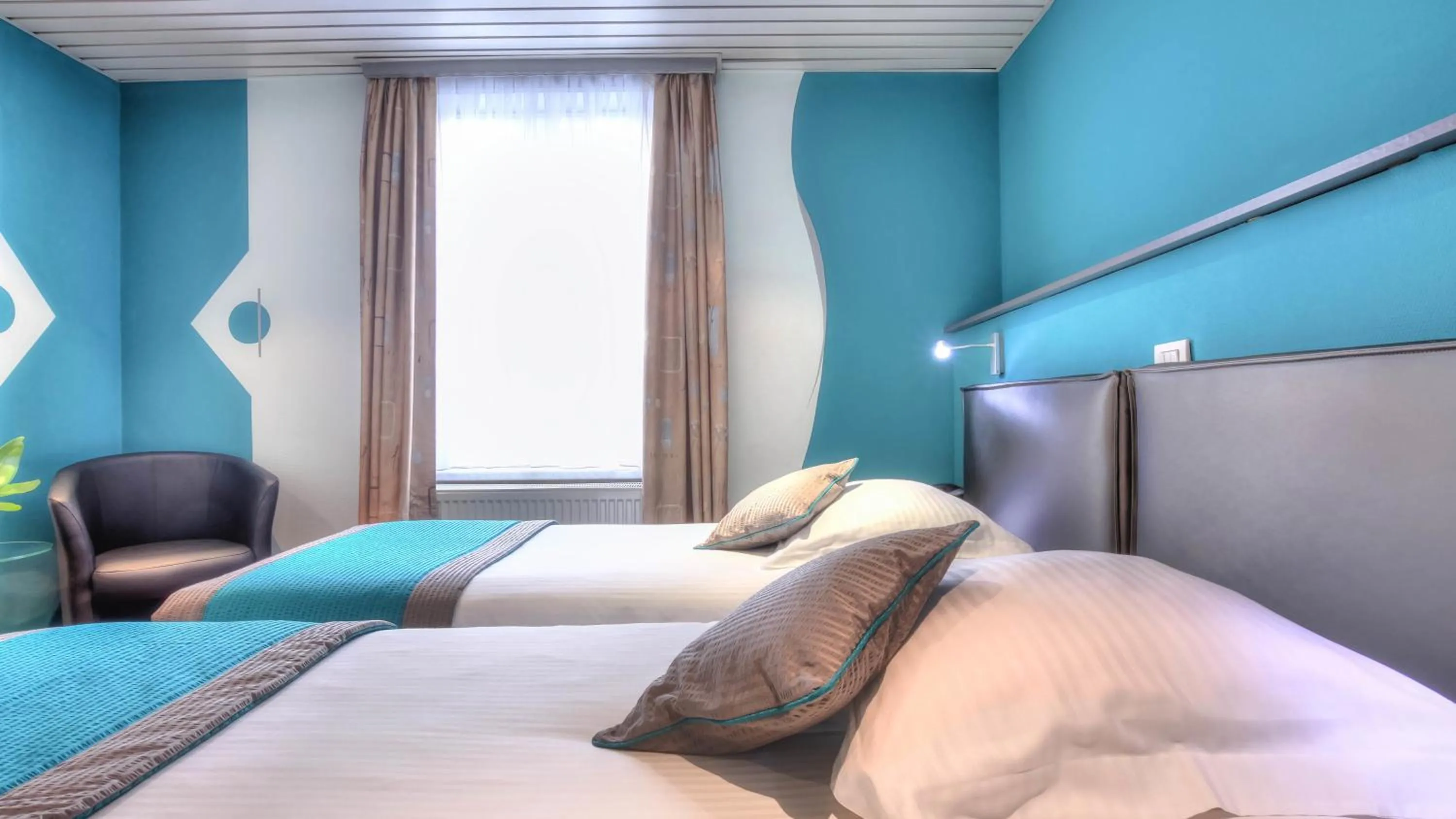 TV and multimedia, Bed in Hotel Le Terminus