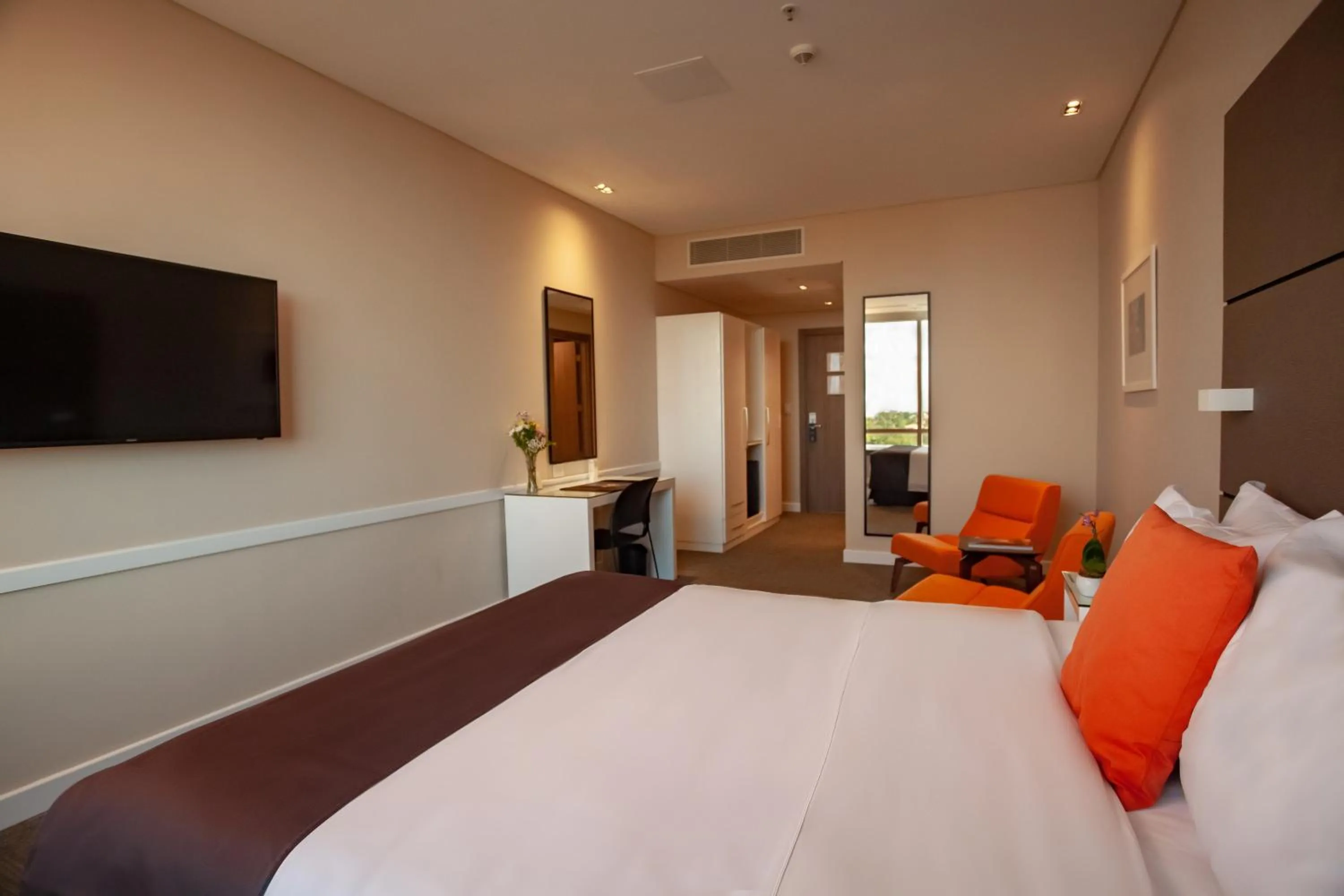 Bed in Paseo La Galería Hotel & Suites