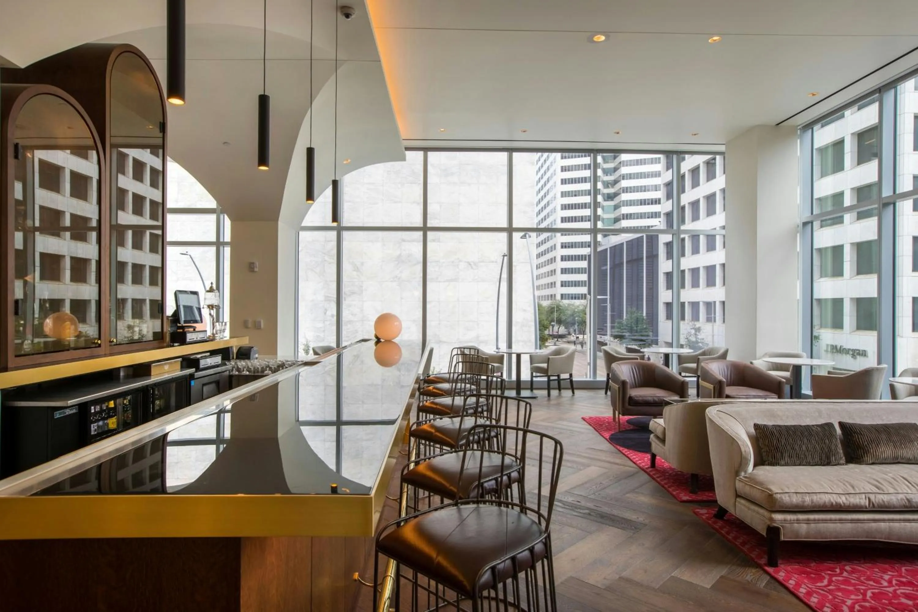 Lounge or bar in The Laura Hotel, Houston Downtown, Autograph Collection