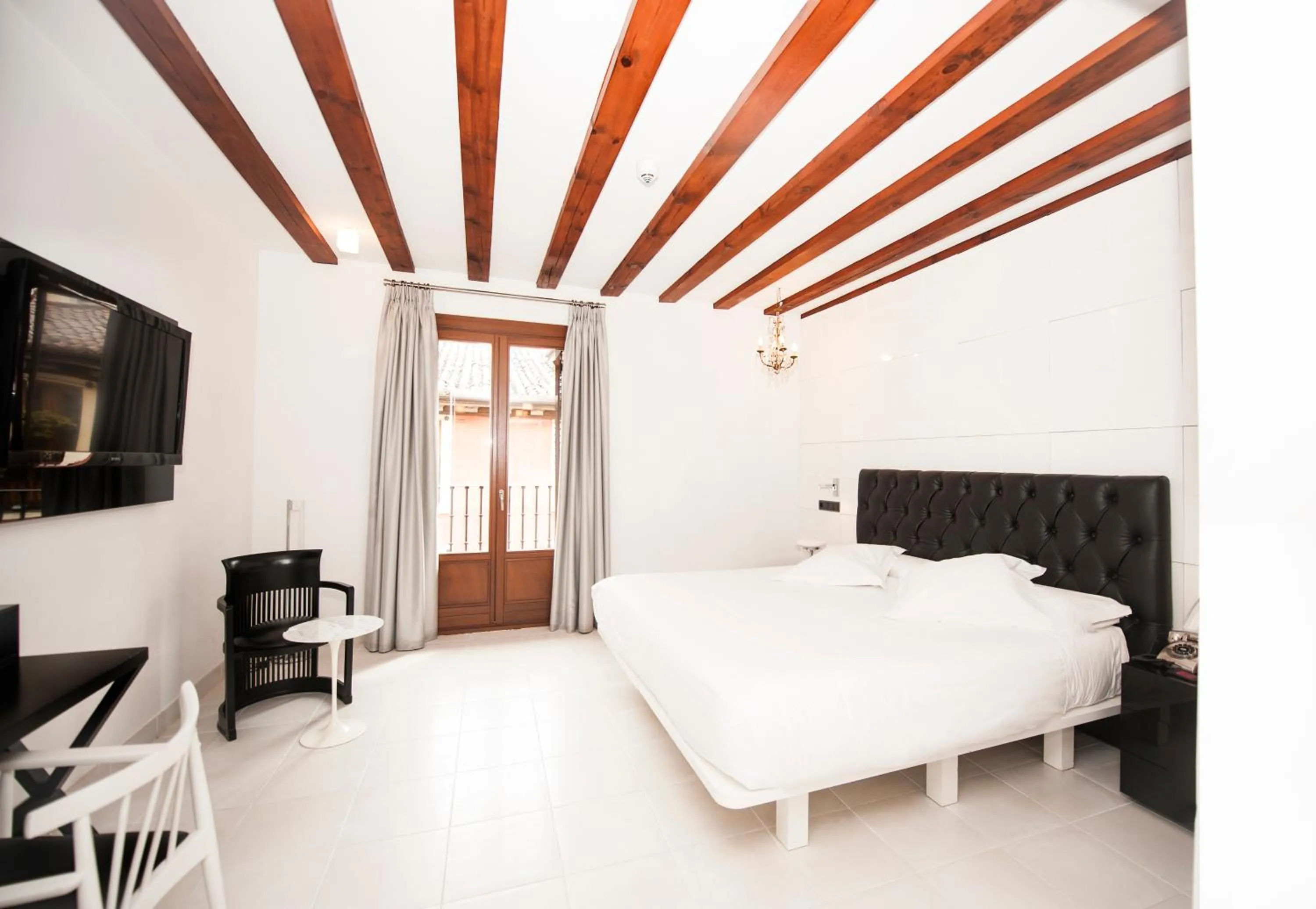 Photo of the whole room, Bed in Posada del León de Oro Boutique Hotel