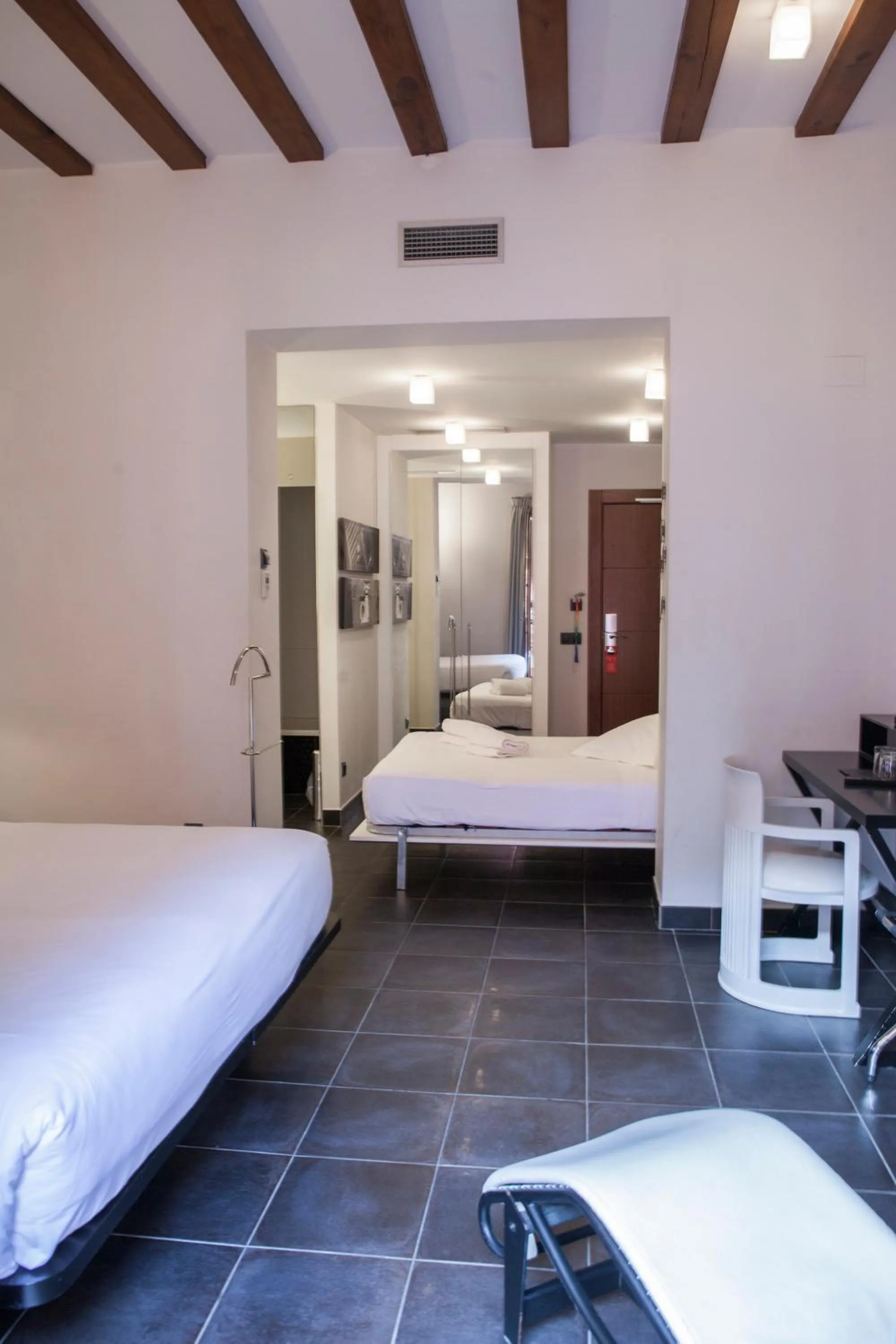 Photo of the whole room, Bed in Posada del León de Oro Boutique Hotel