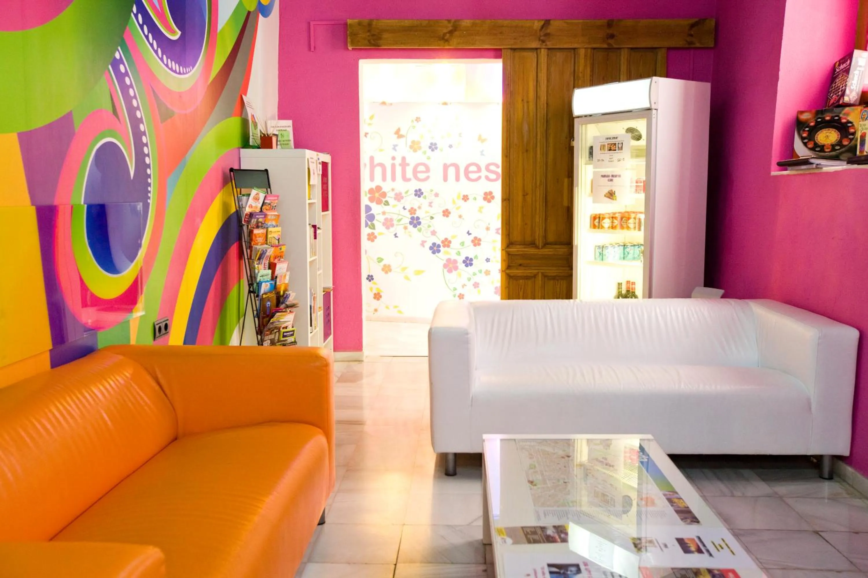 Communal lounge/ TV room in White Nest Hostel