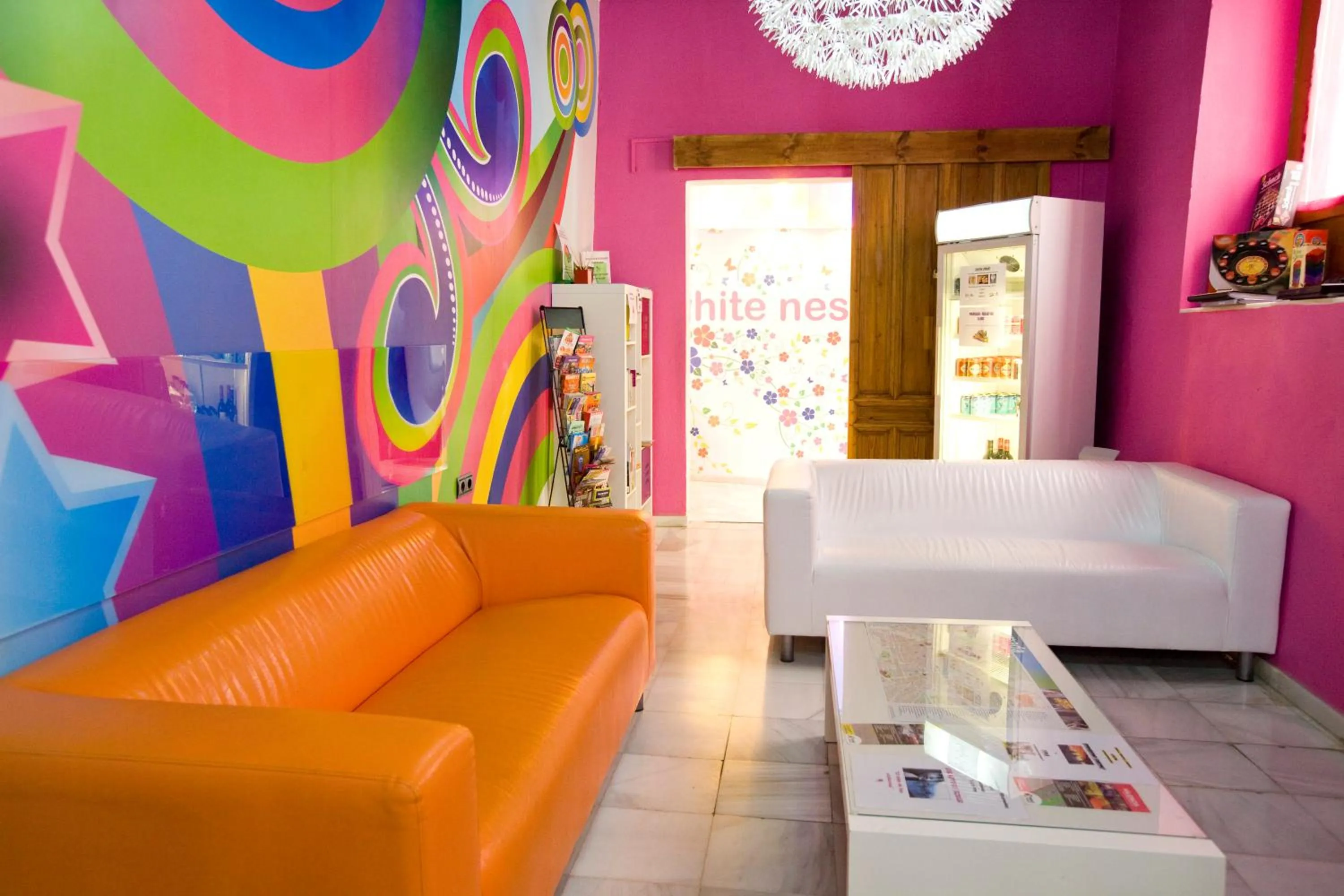 Communal lounge/ TV room in White Nest Hostel