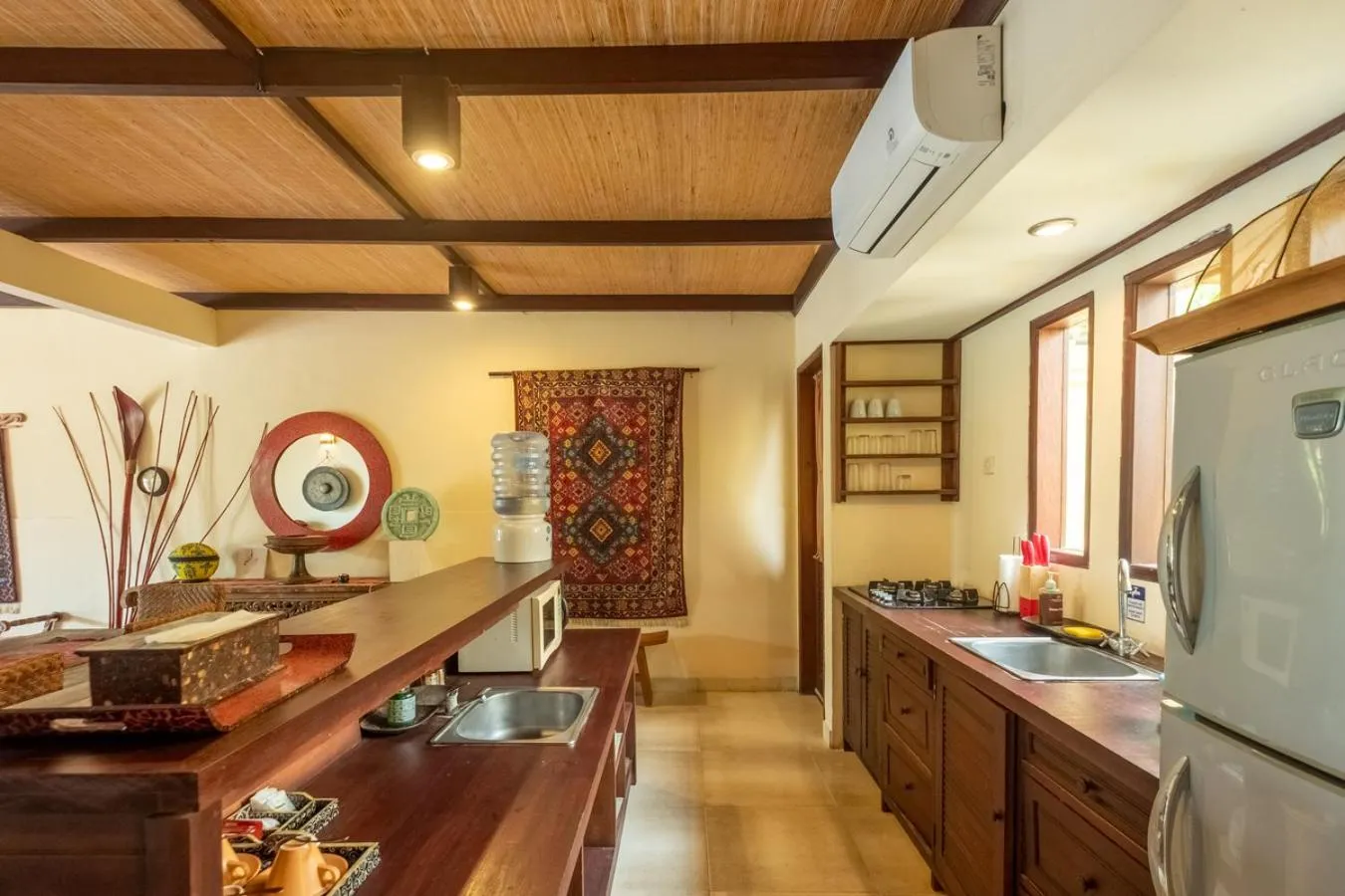 Kitchen or kitchenette in Amertha Bali Villas