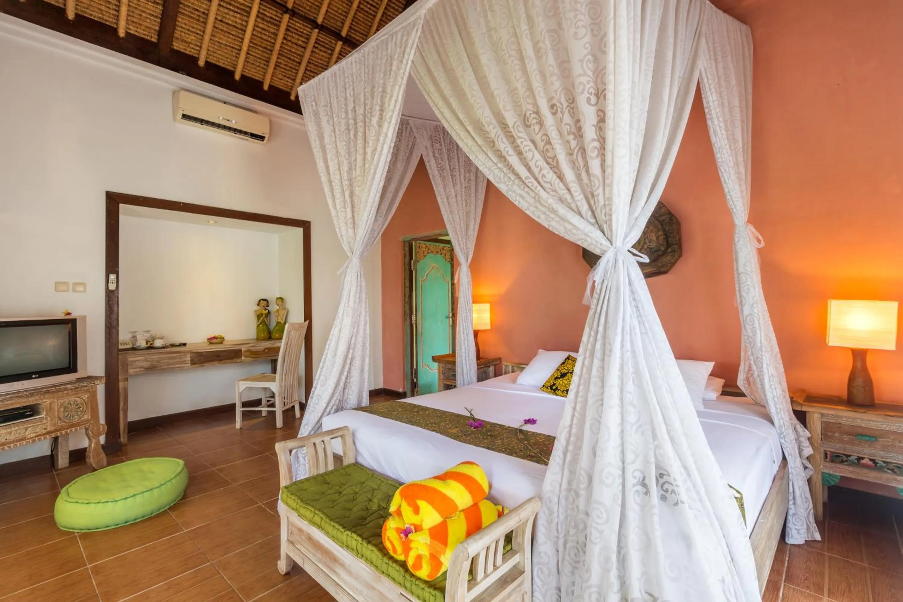 Bed in Puri Taman Sari Resort