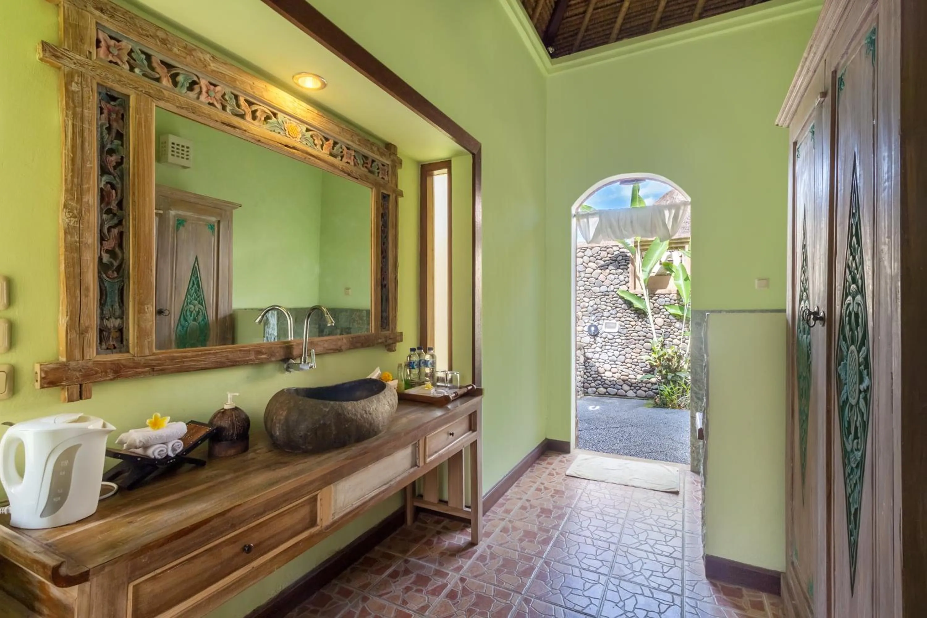 Bathroom in Puri Taman Sari Resort