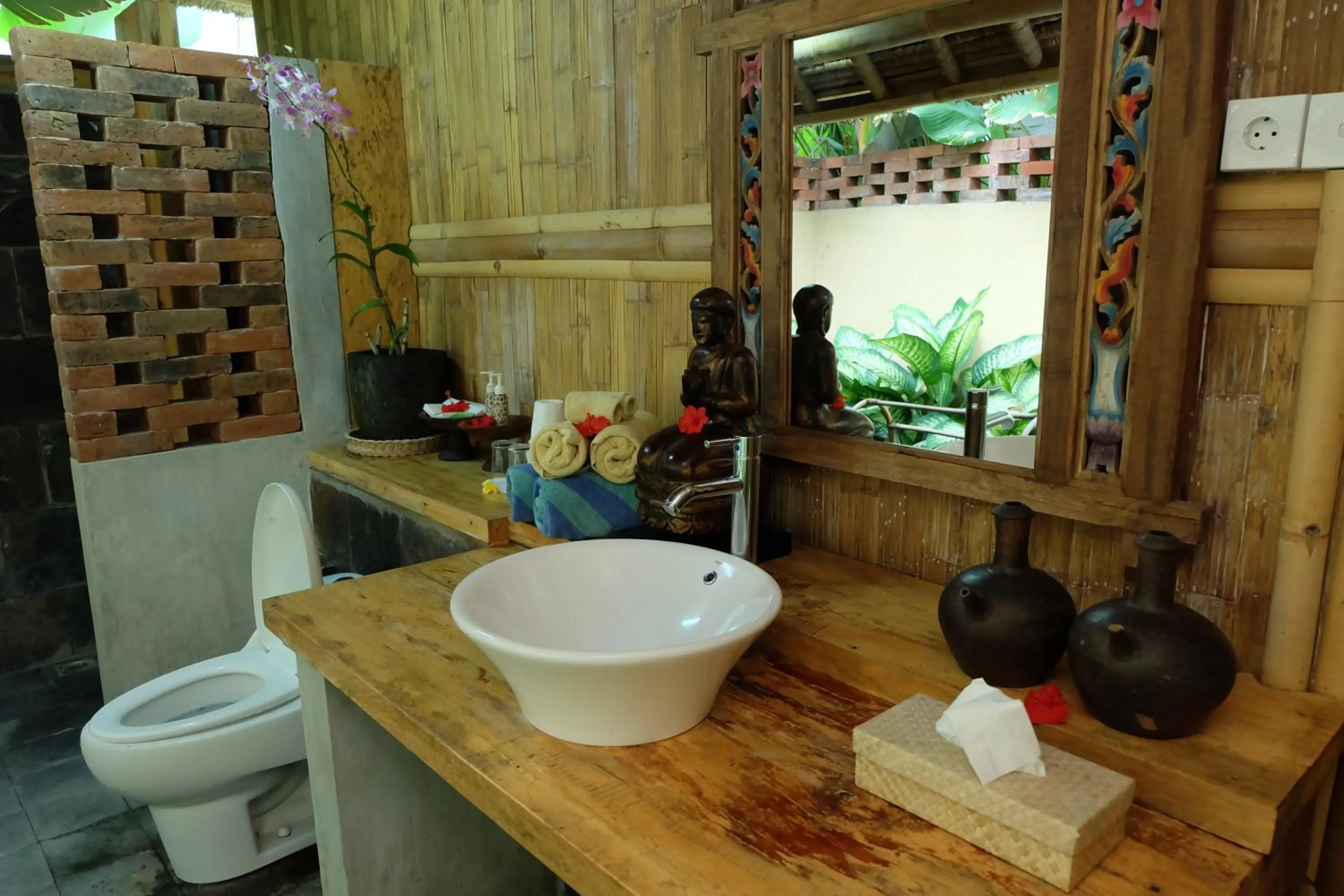 Bathroom in Puri Taman Sari Resort