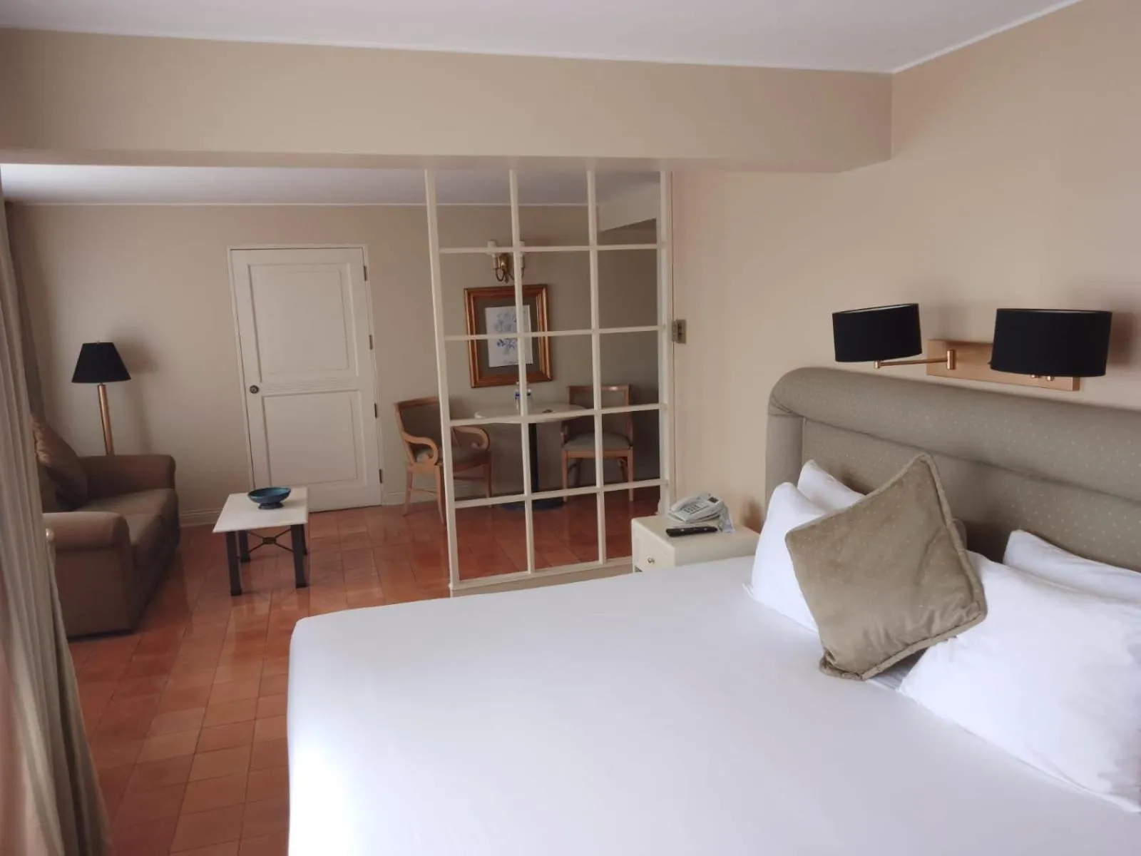 Bed in Suites del Bosque Hotel