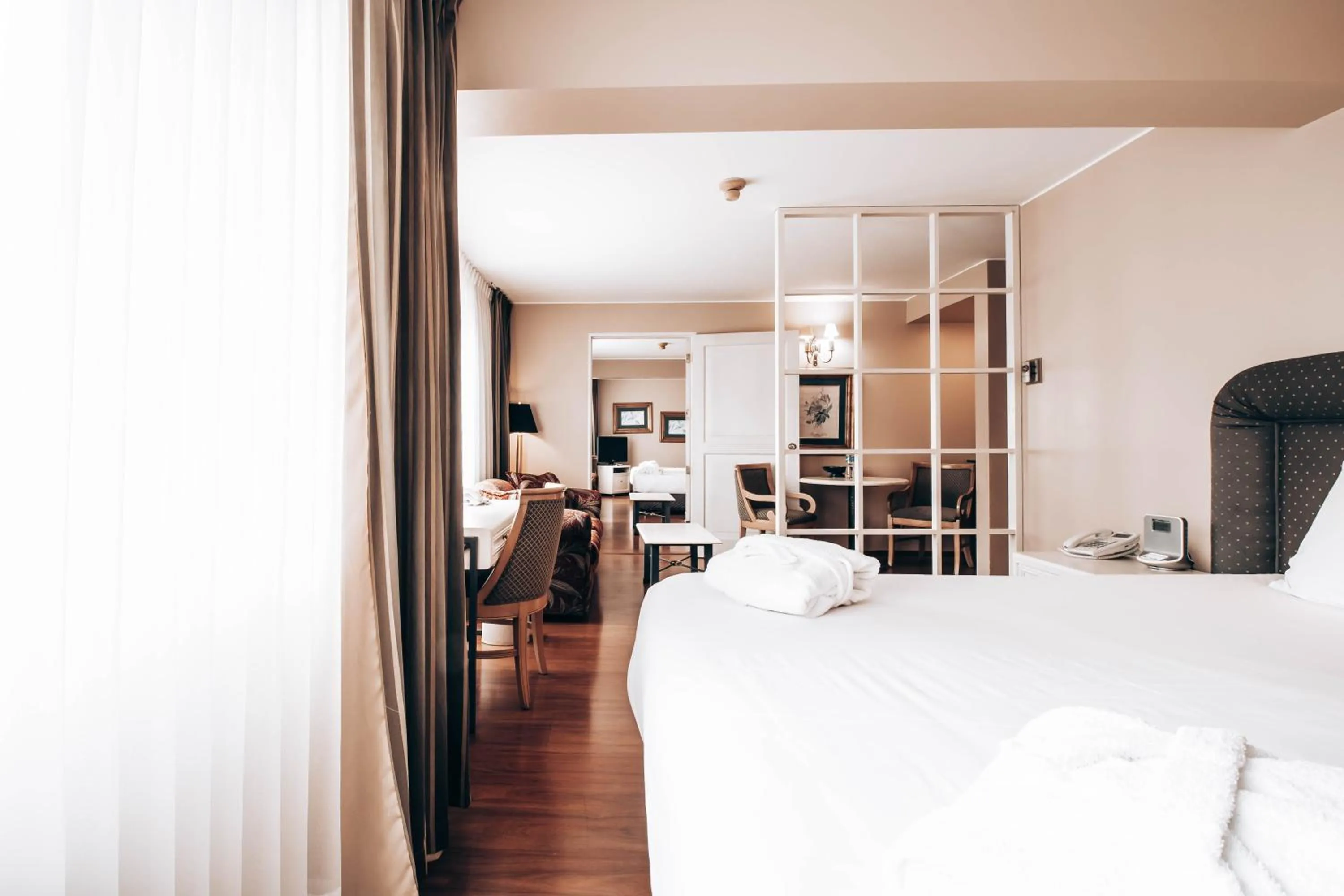 Bed in Suites del Bosque Hotel