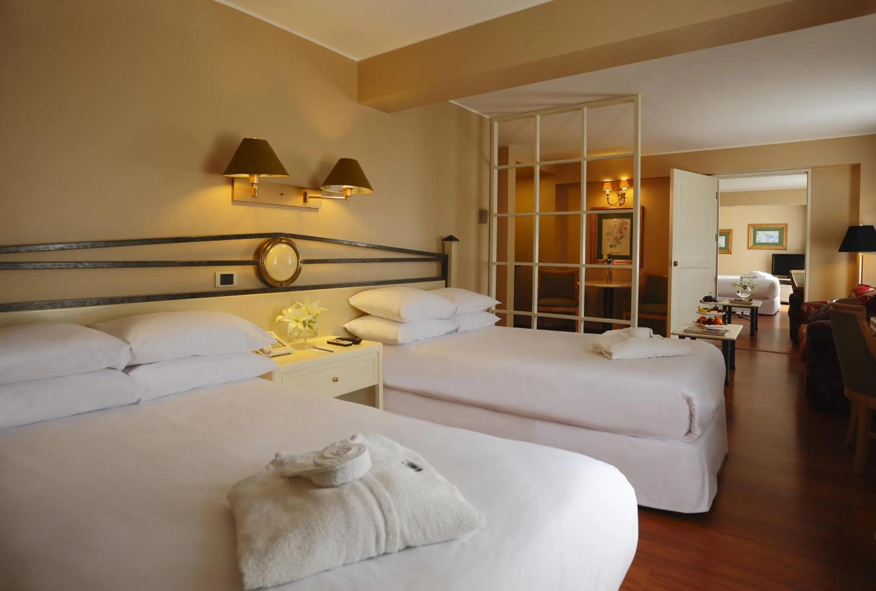 Bed in Suites del Bosque Hotel