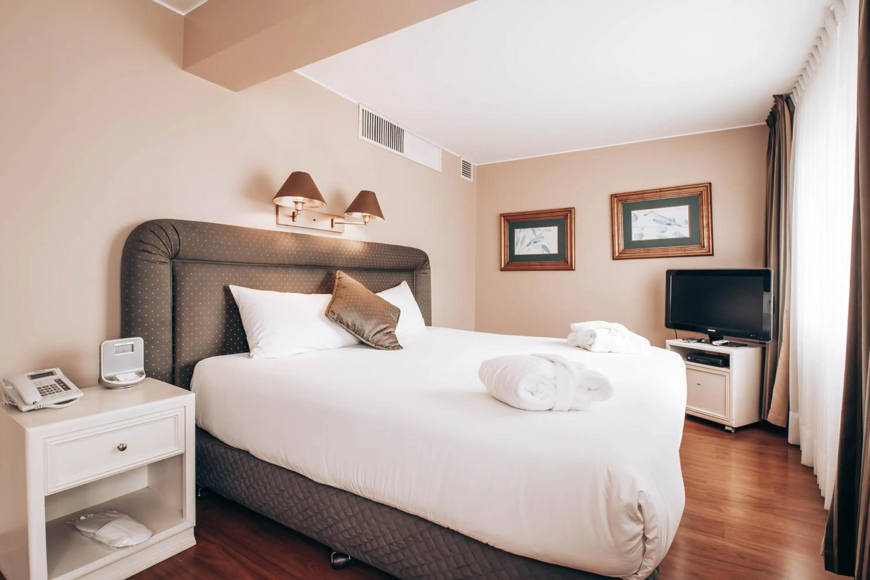 Bed in Suites del Bosque Hotel