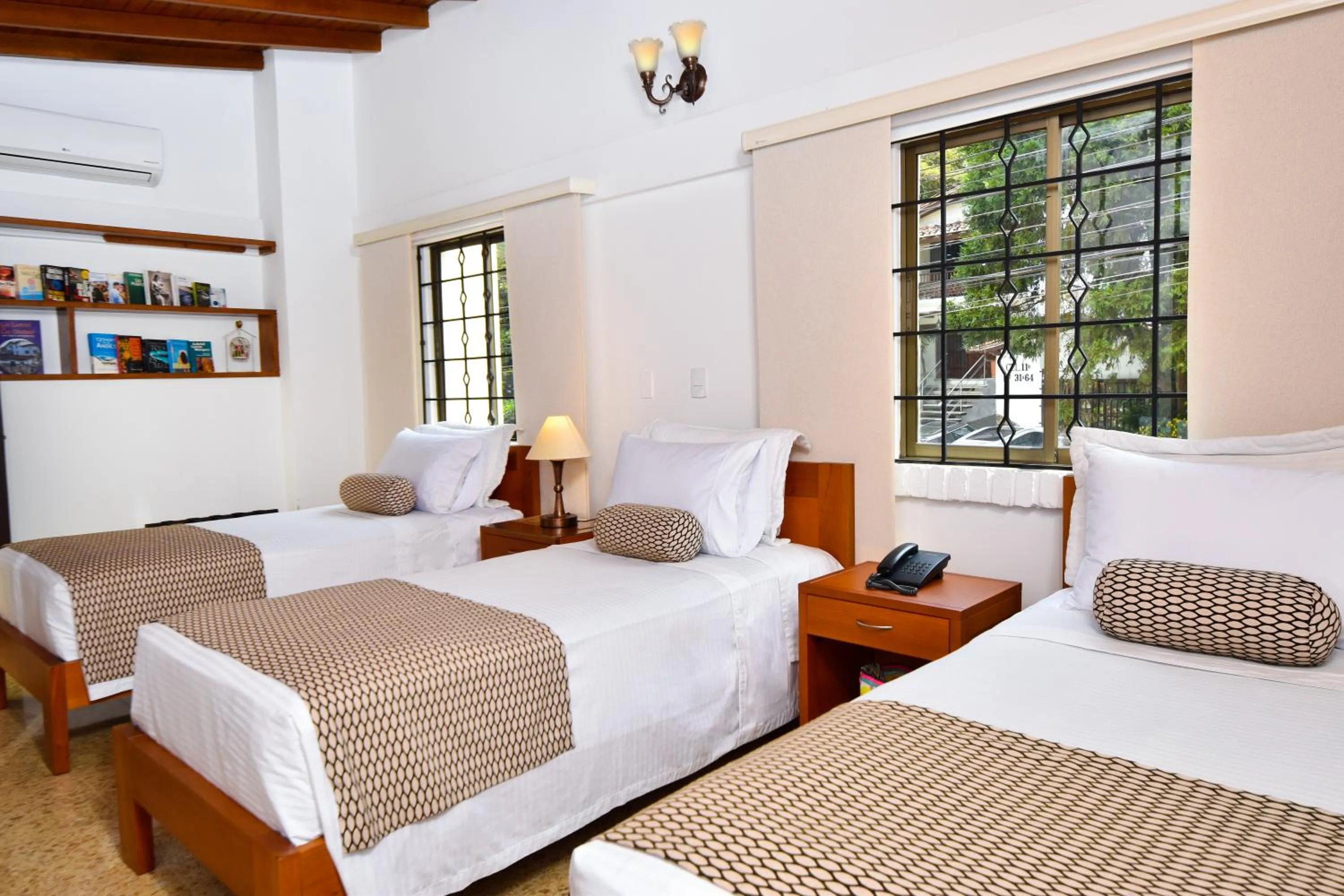 Bed in La Campana Hotel Boutique