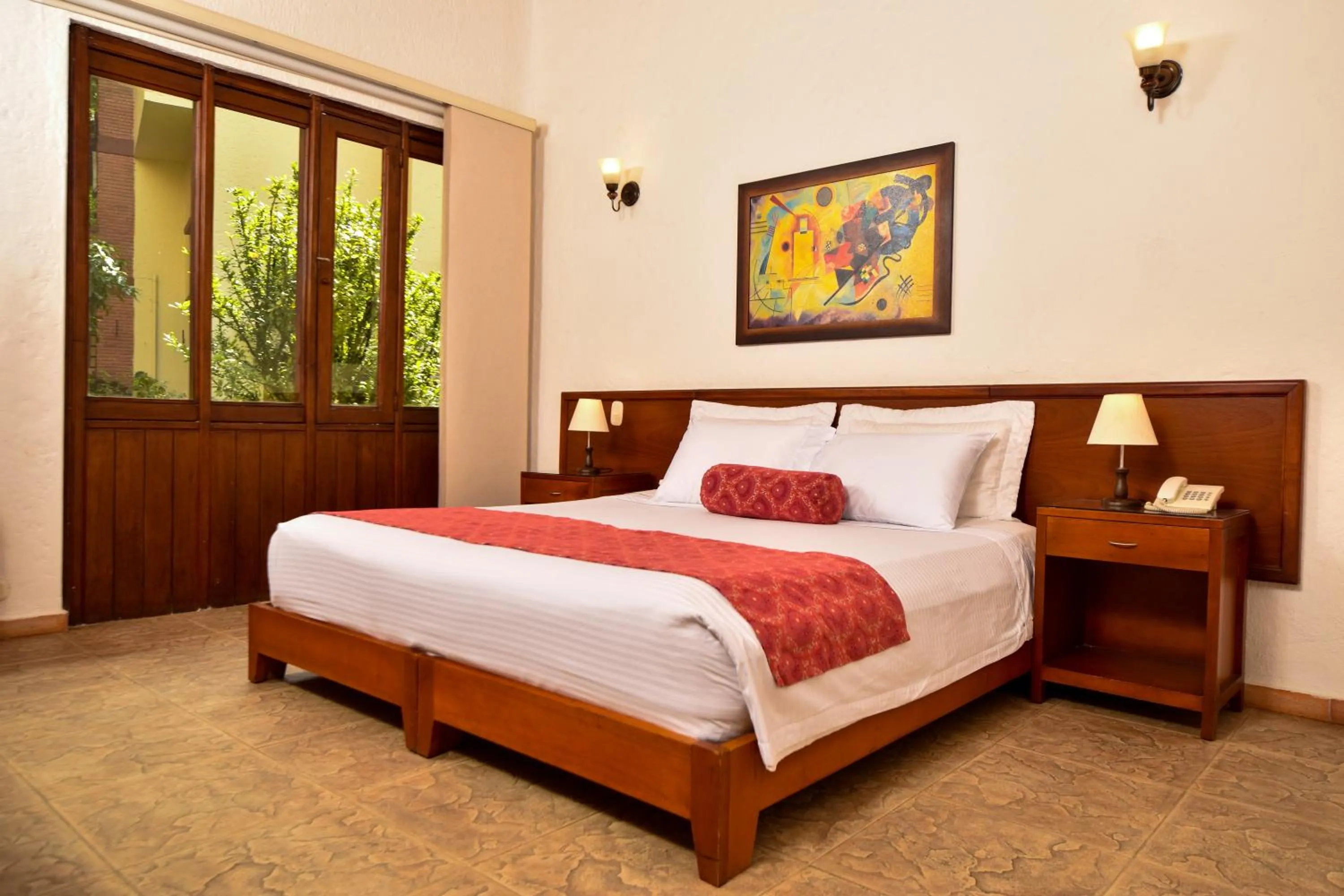 Bed in La Campana Hotel Boutique