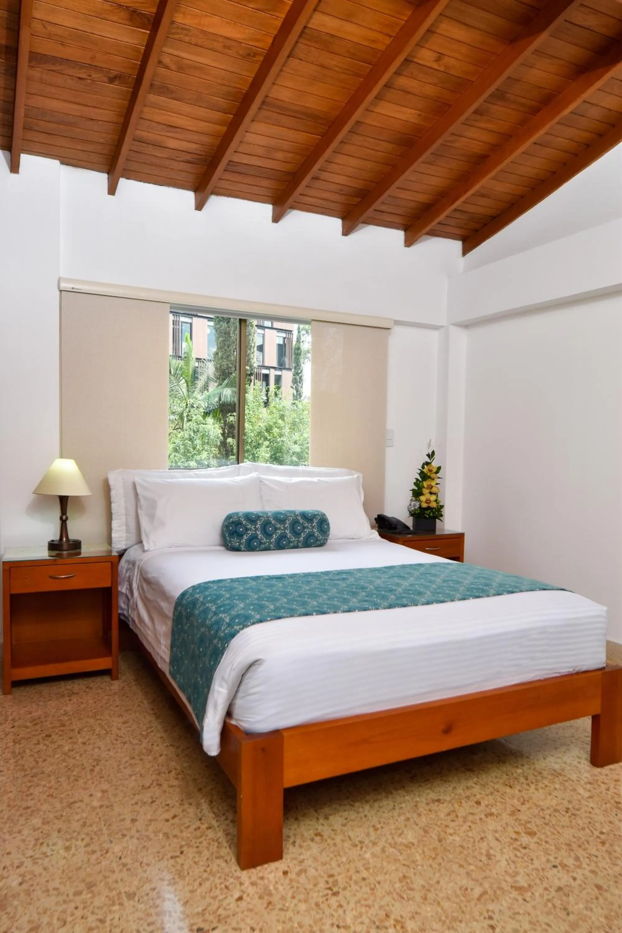 Bed in La Campana Hotel Boutique