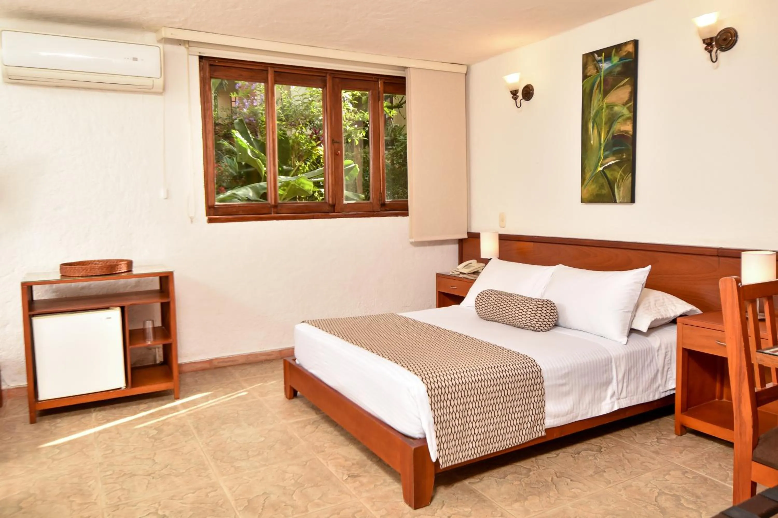 Bed in La Campana Hotel Boutique