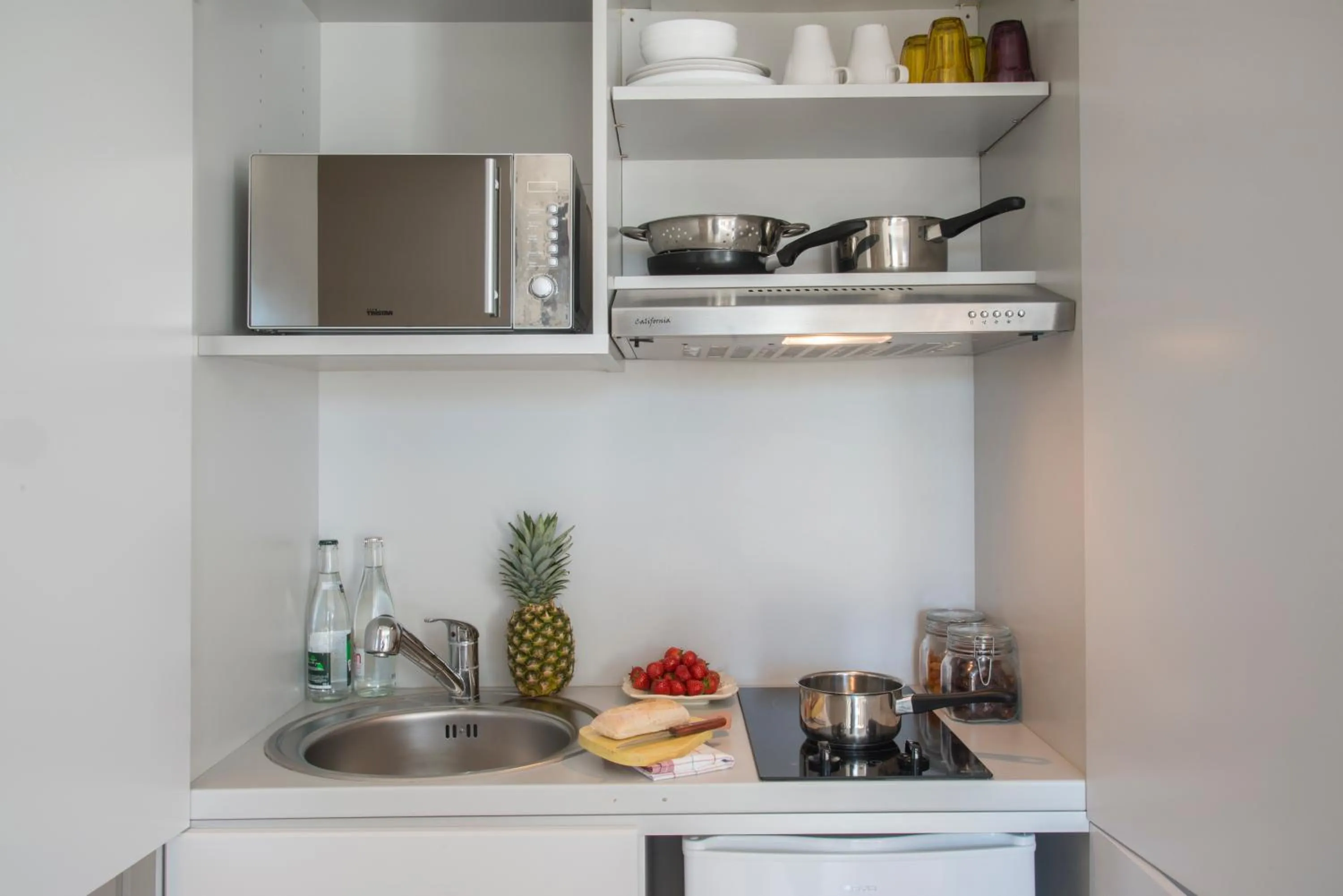 Kitchen or kitchenette in La Bastide de l'Oliveraie