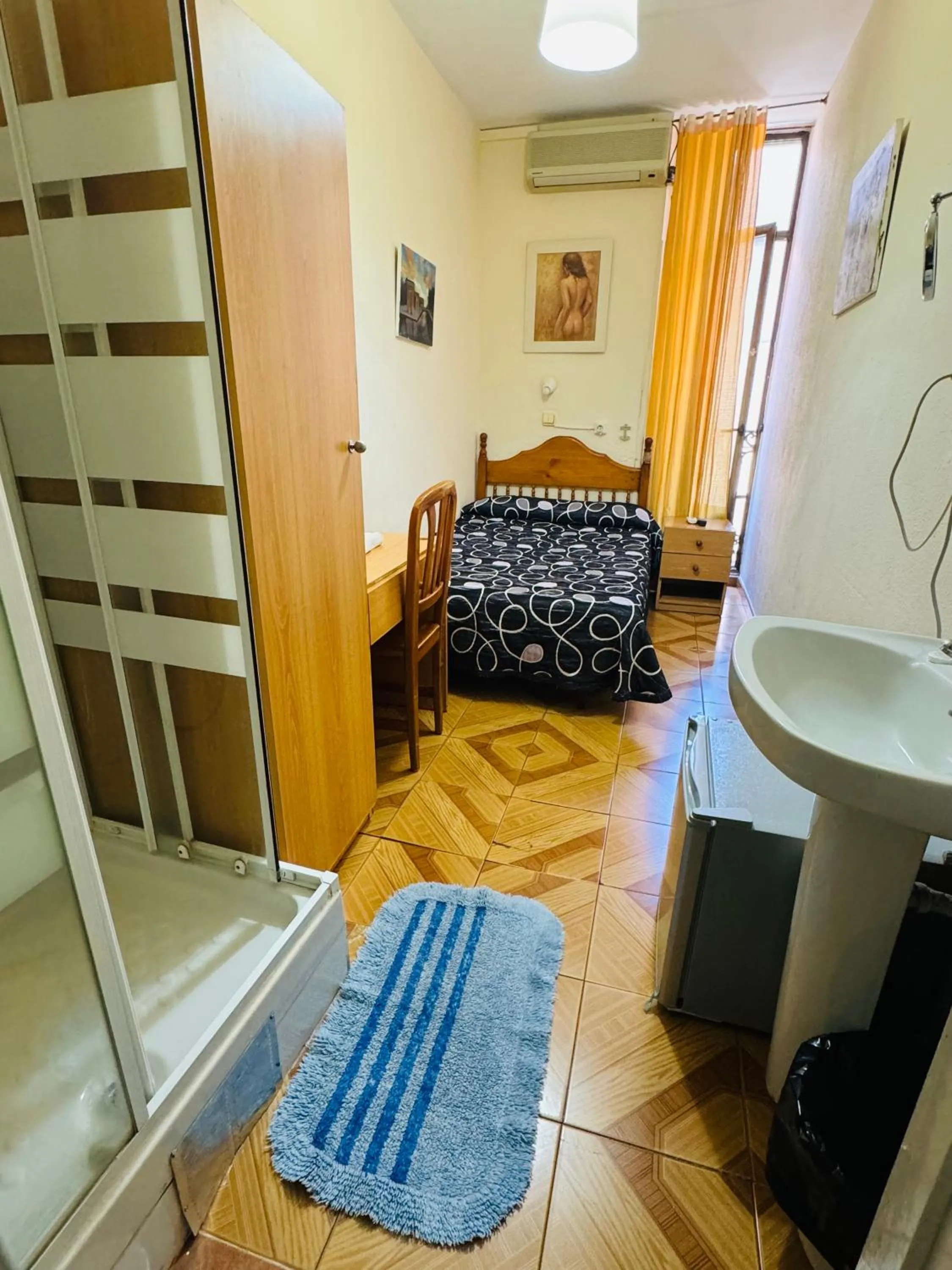 Bed in Hostal Fuentesol