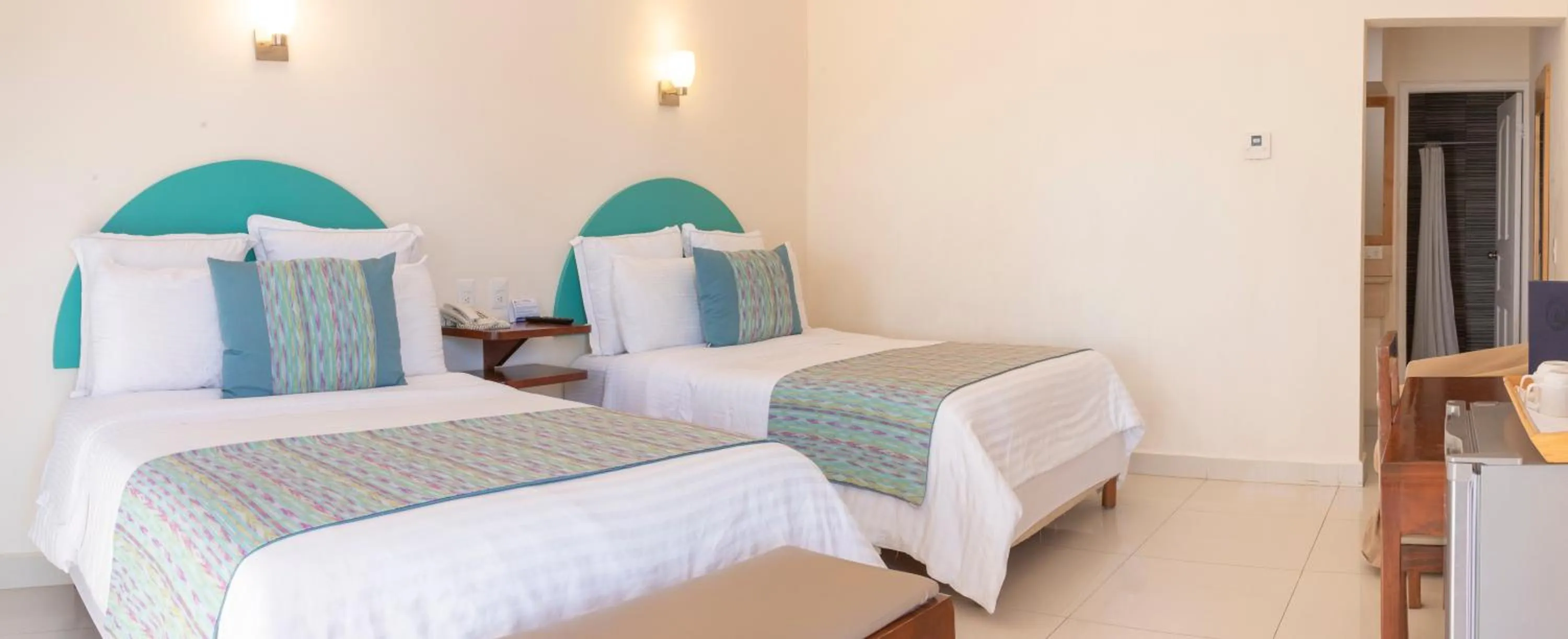 Bed in The Westmarine Waterfront Hotel