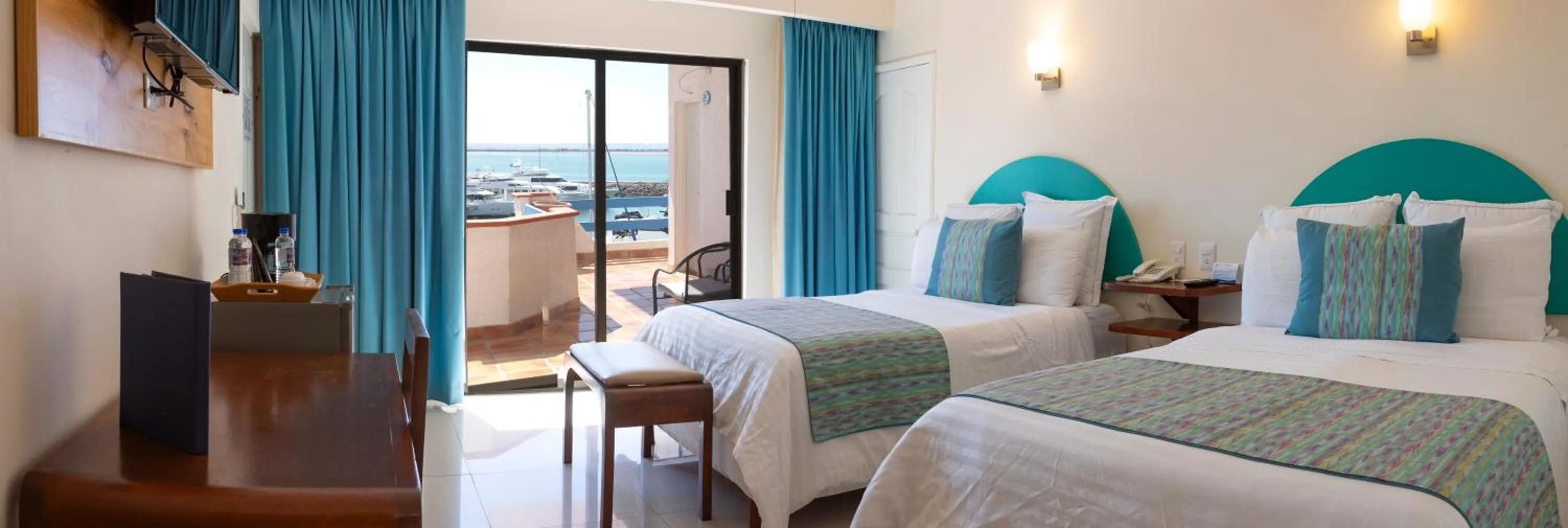 Bed in The Westmarine Waterfront Hotel