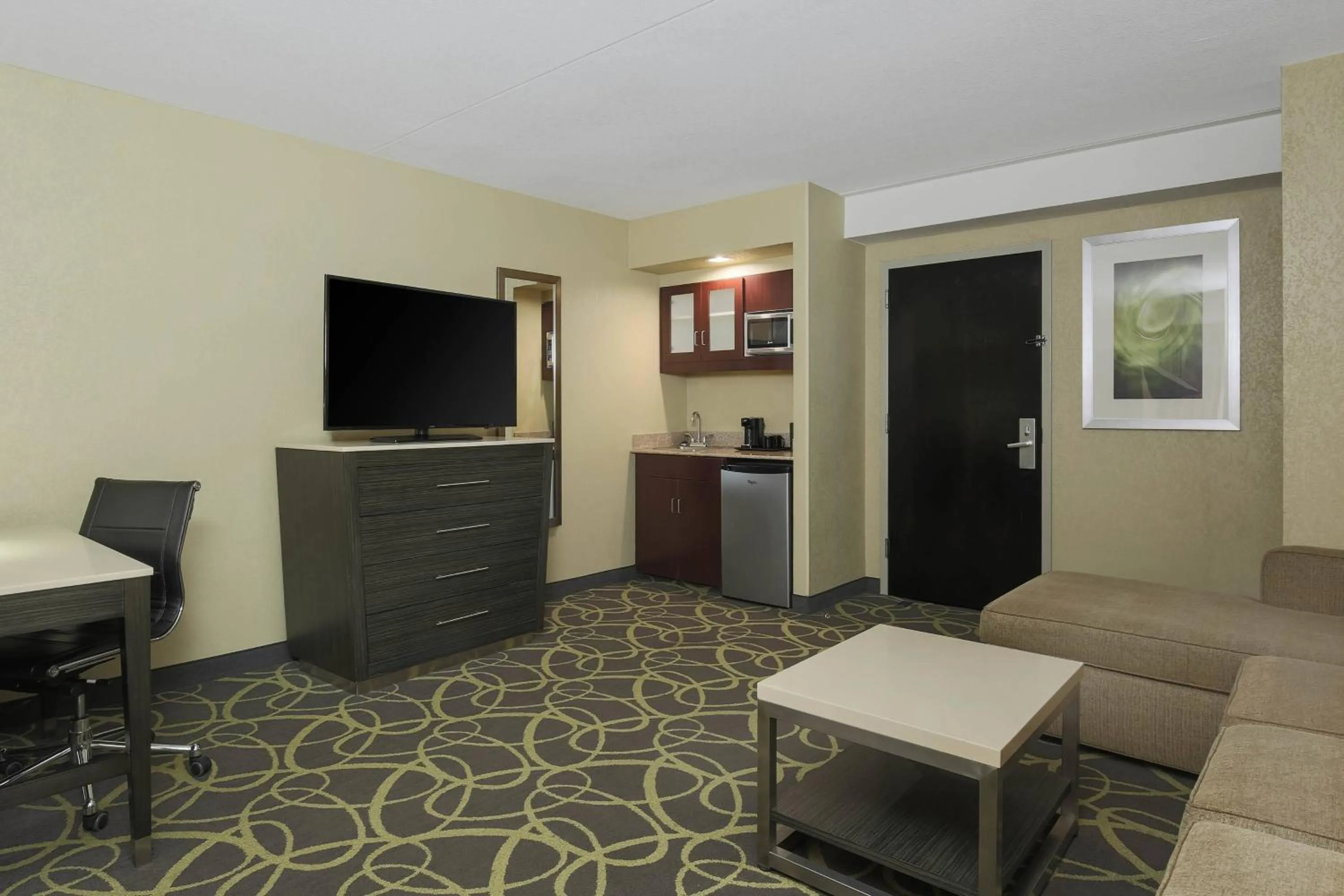 Living room in SpringHill Suites by Marriott Oklahoma City Quail Springs