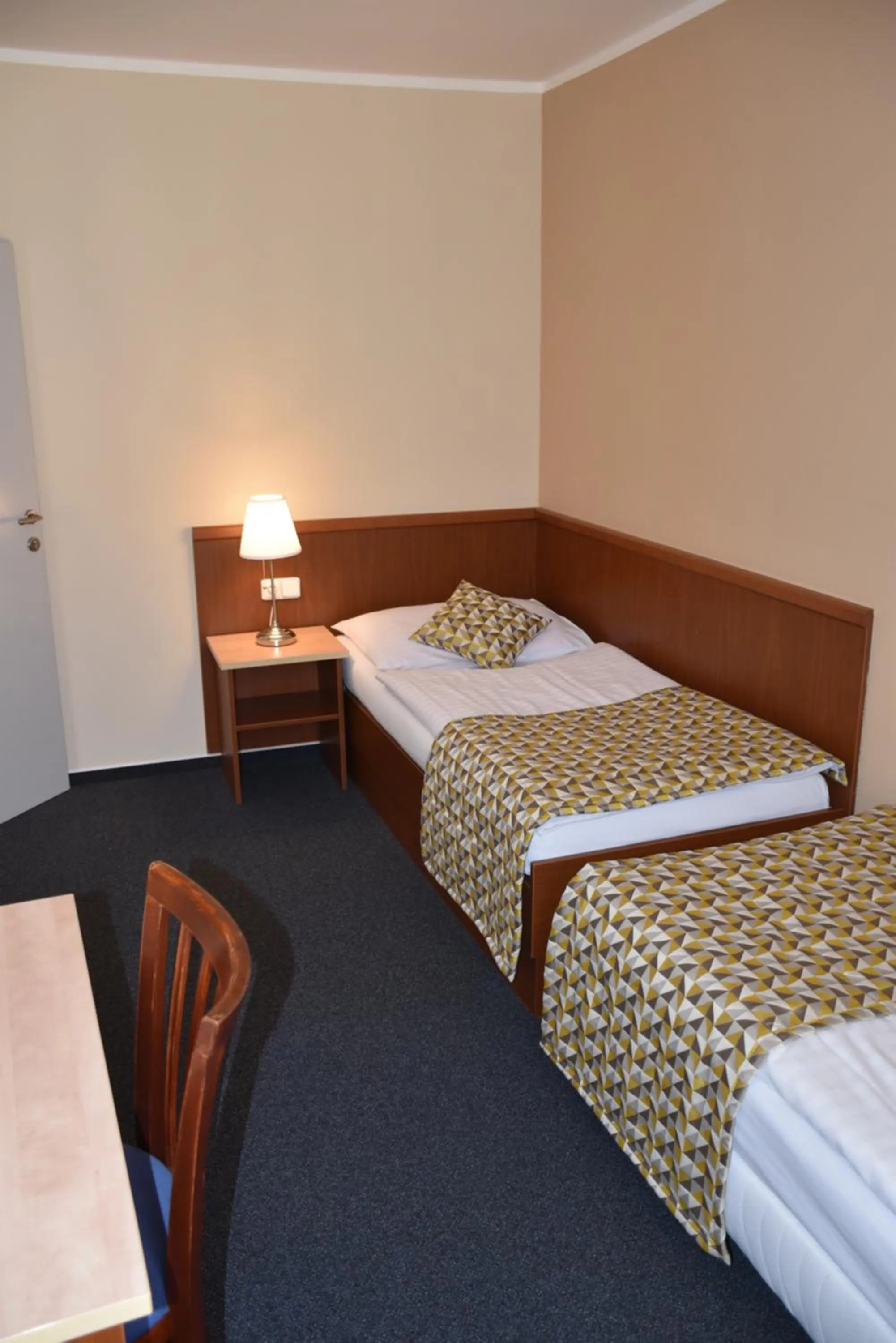 Bed in Aparthotel Austria Suites