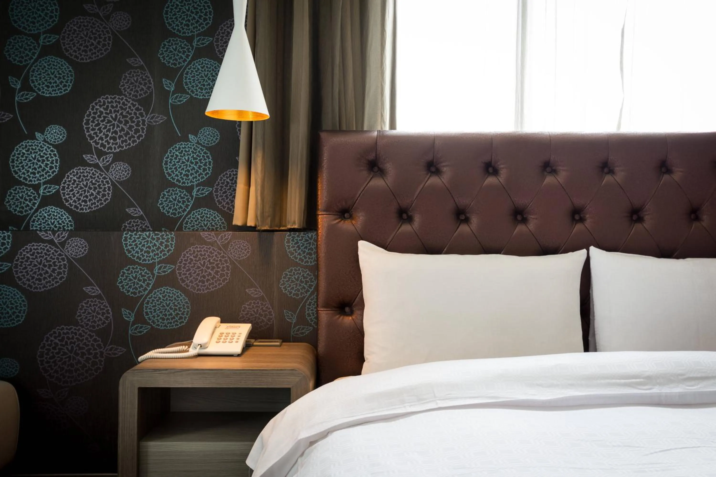 Bed in JUNG-ZAW BUSSINESS HOTEL