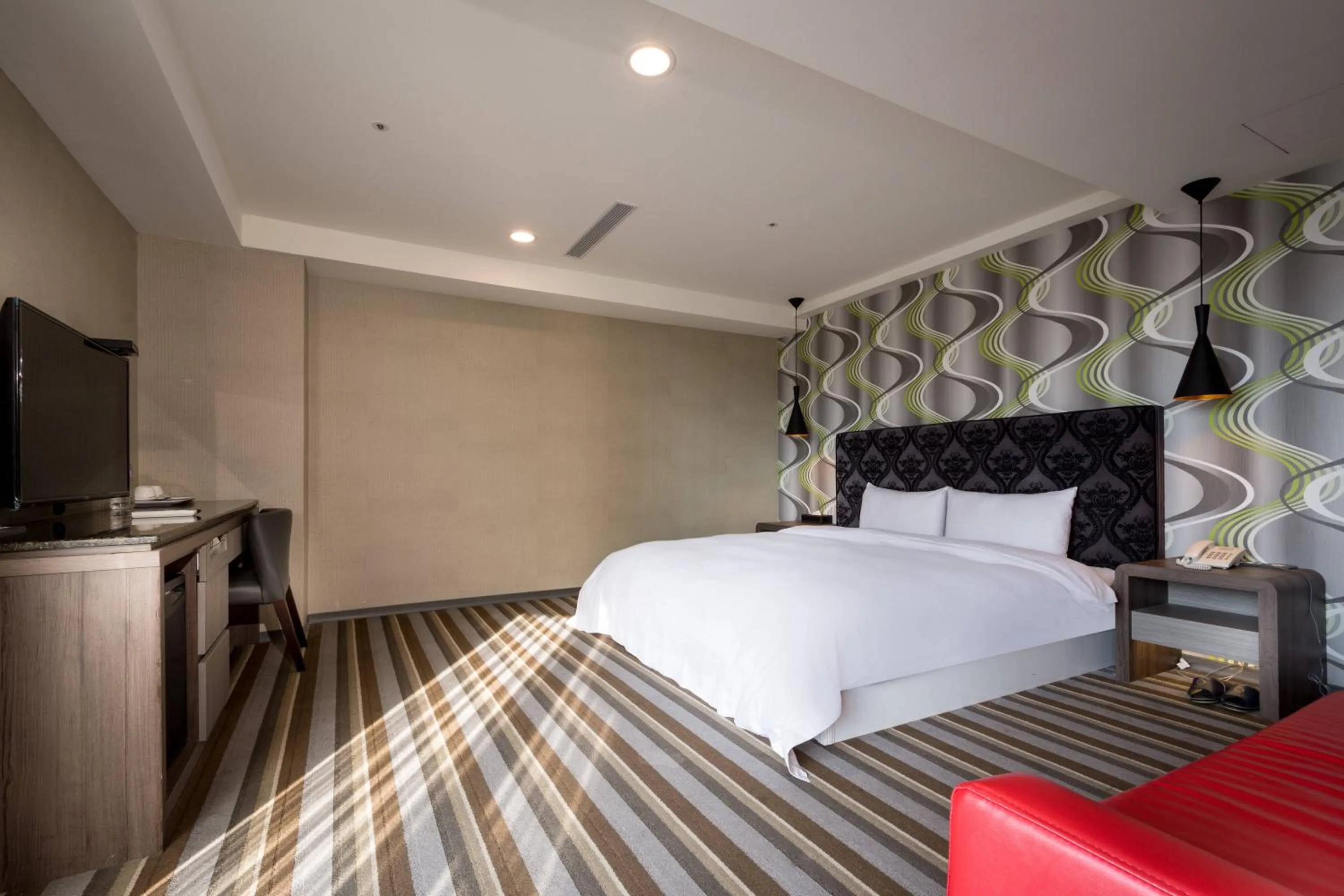 Bed in JUNG-ZAW BUSSINESS HOTEL