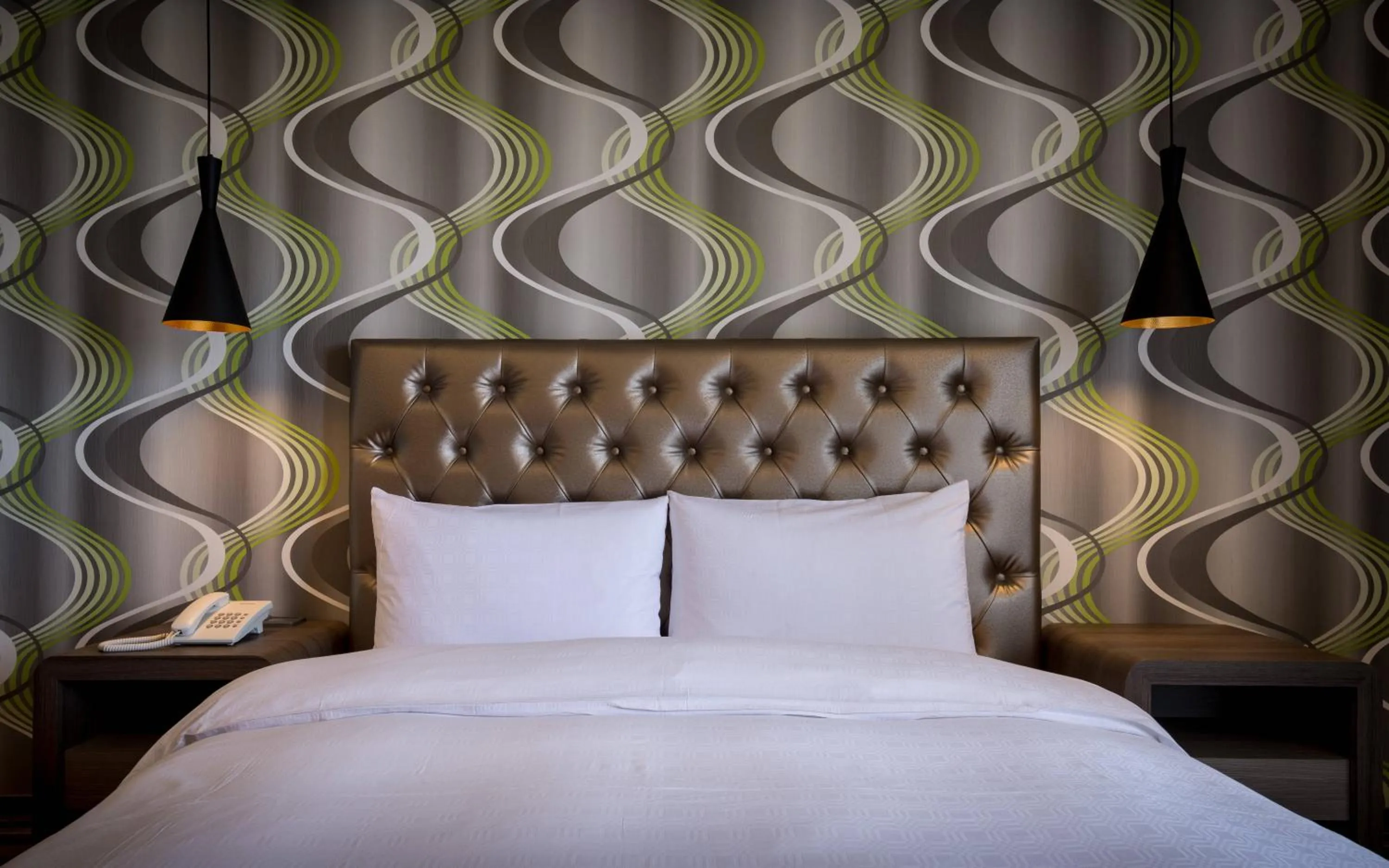 Bed in JUNG-ZAW BUSSINESS HOTEL