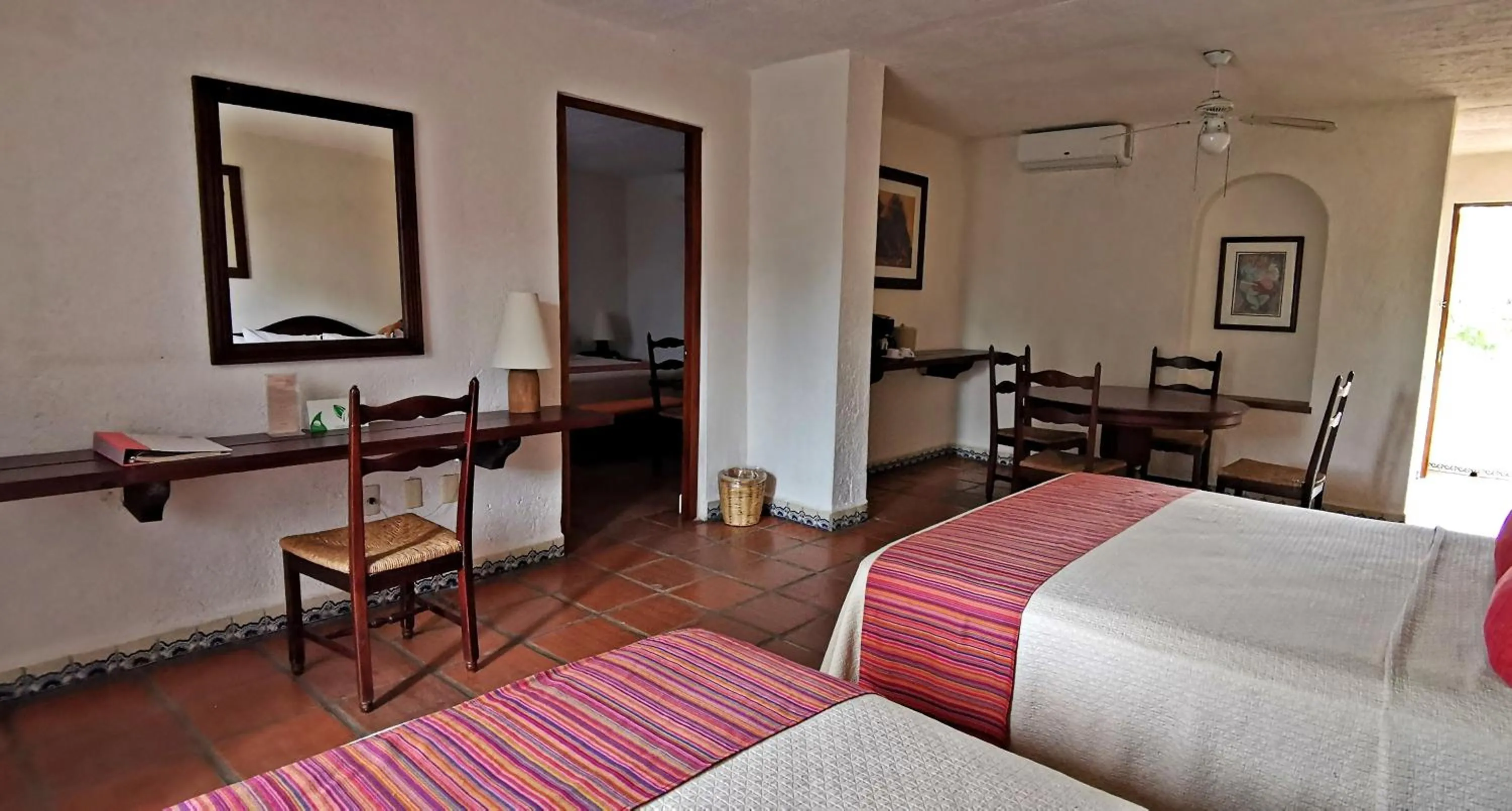 Photo of the whole room, Bed in Villa Blanca Huatulco