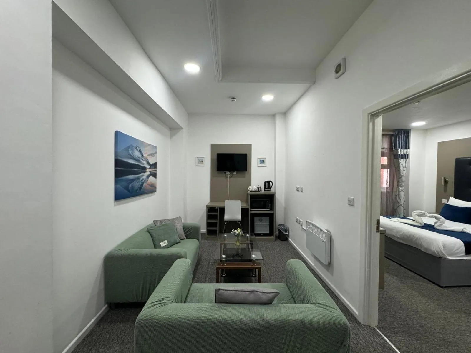 Seating area, Bed in Abbey Hotel