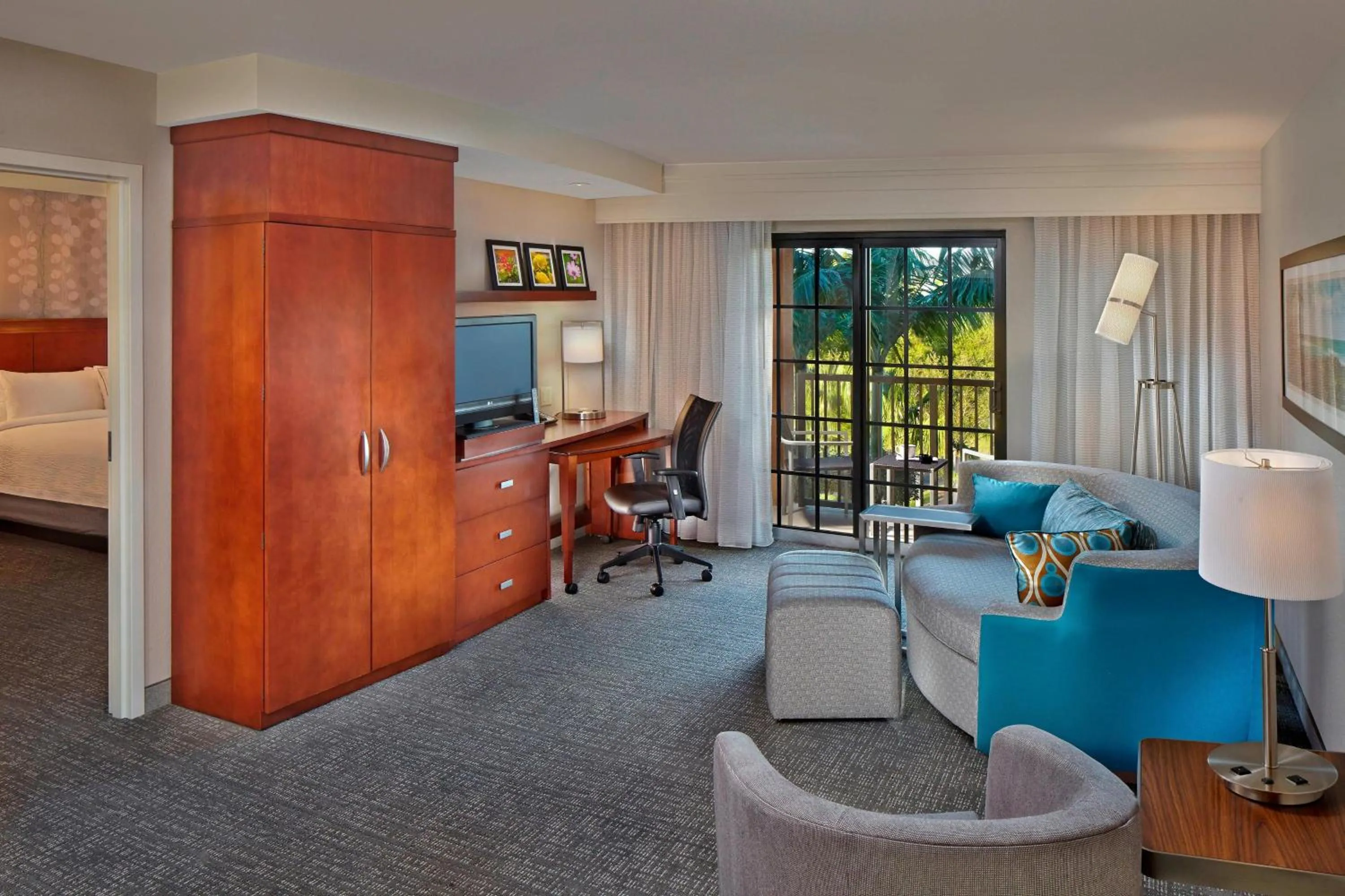 Living room in Courtyard by Marriott Stuart