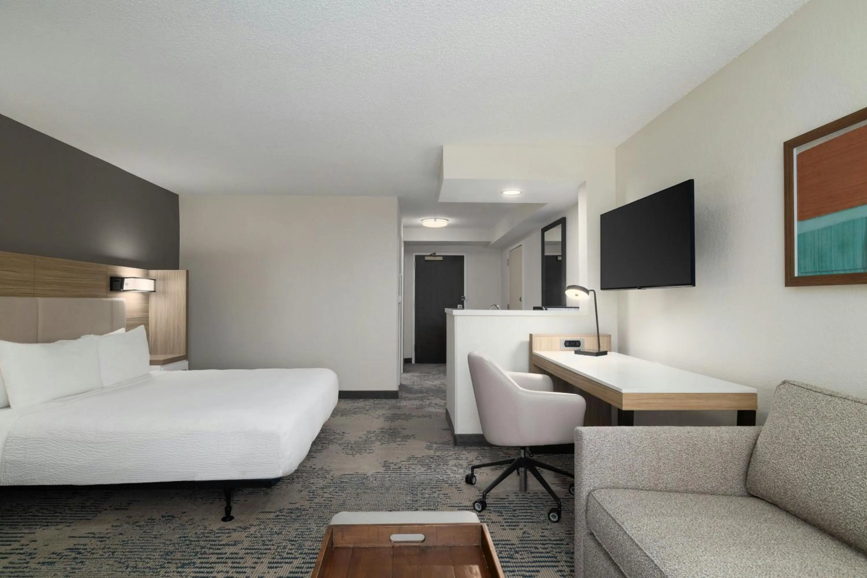 Photo of the whole room, Bed in SpringHill Suites Boca Raton