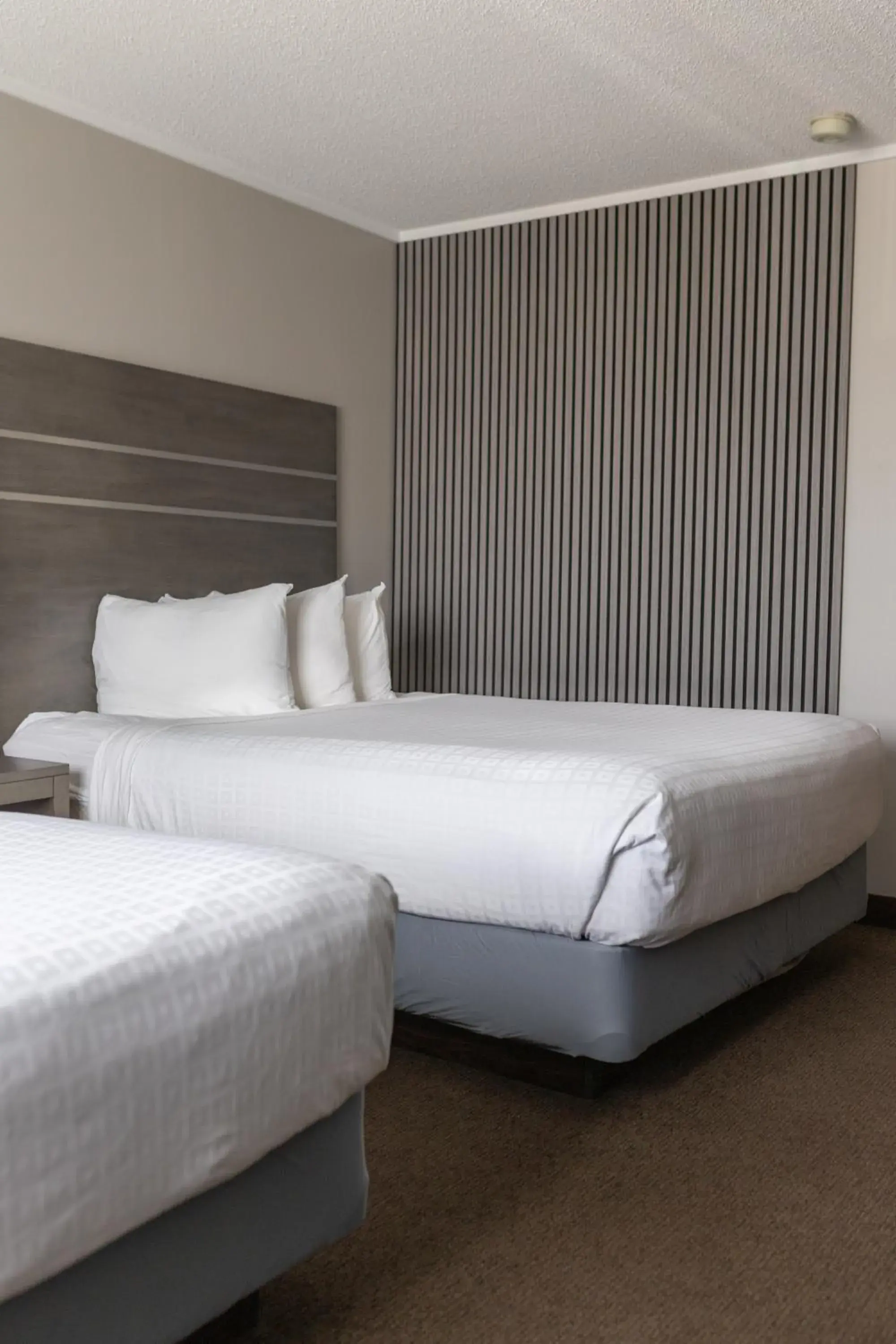 Deluxe Queen Room with Two Queen Beds in The Thompson Hotel Deluxe Queen Room with Two Queen Beds in The Thompson Hotel