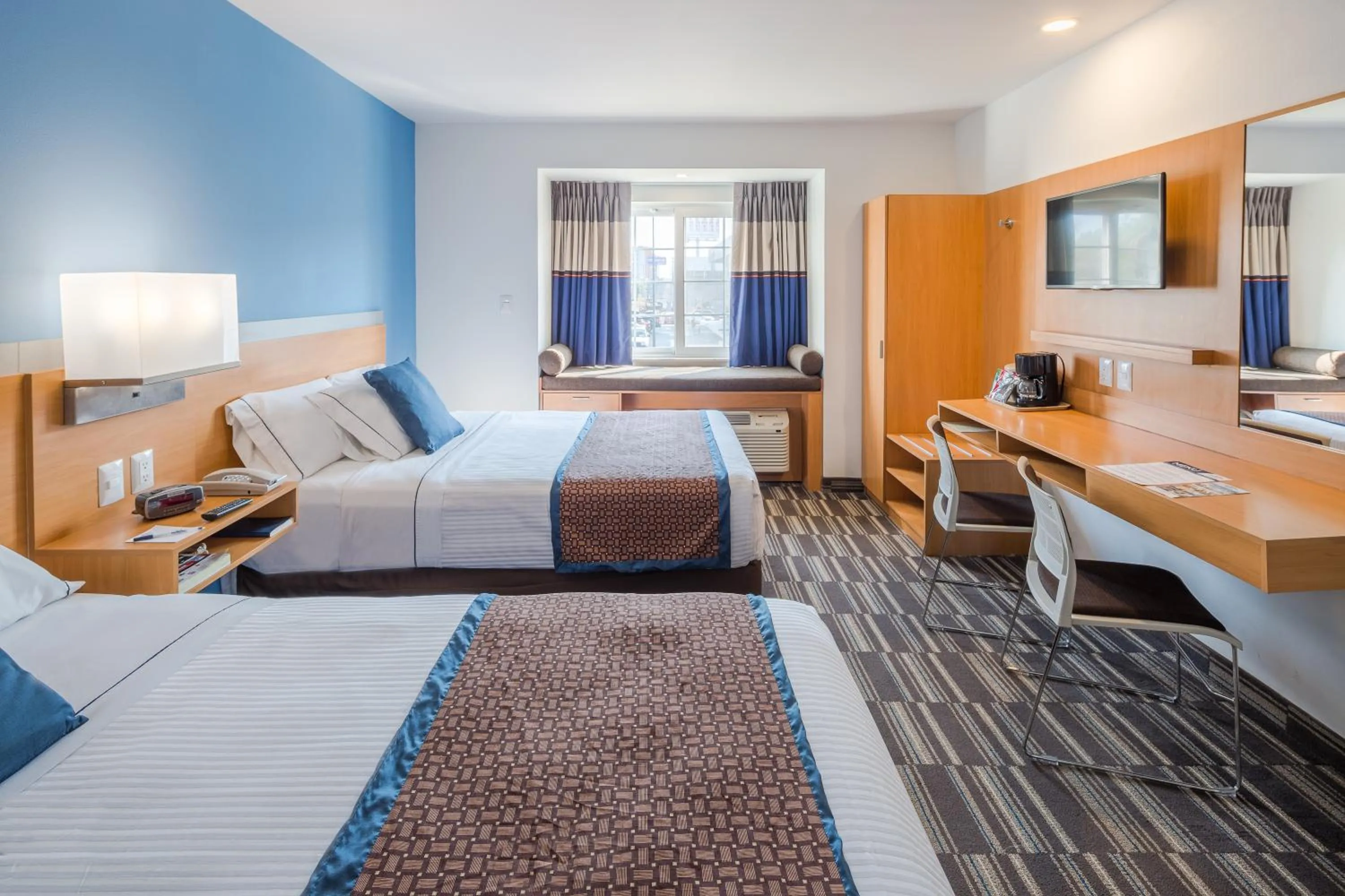 Photo of the whole room, Bed in Microtel Inn & Suites by Wyndham Culiacán