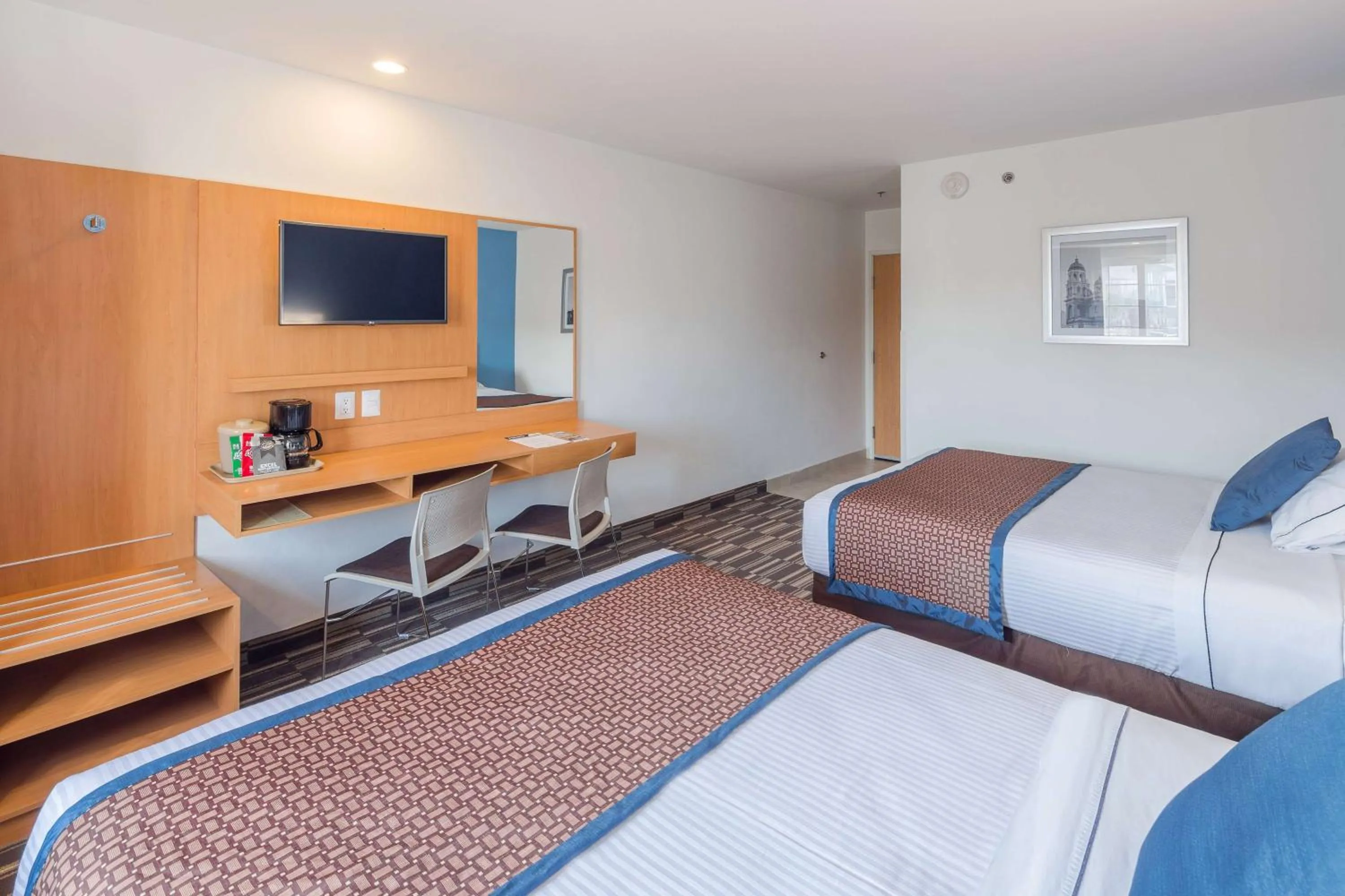 Photo of the whole room, Bed in Microtel Inn & Suites by Wyndham Culiacán
