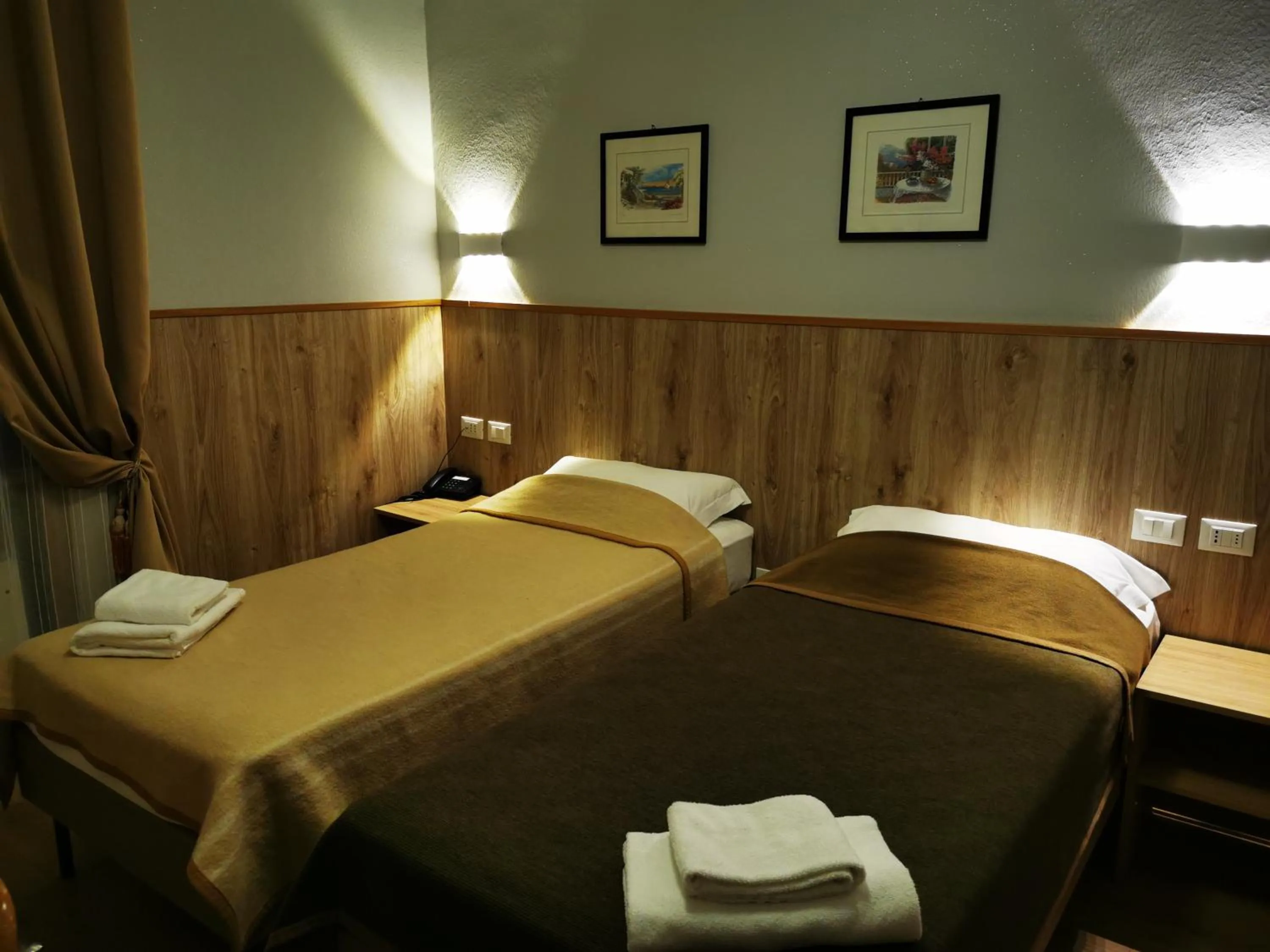 Bed in New Alexander Hotel