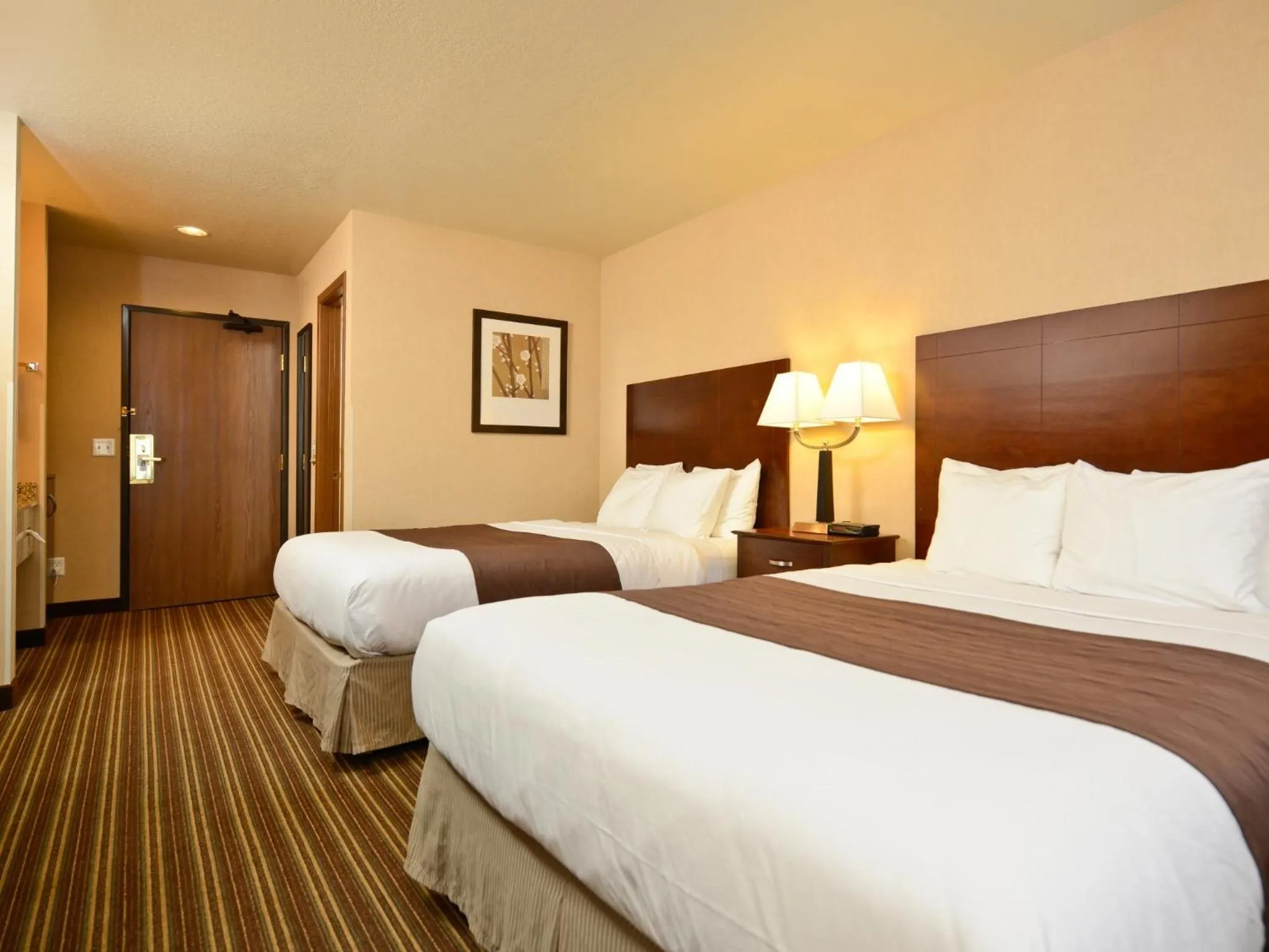 Bed in Yellowstone West Gate Hotel