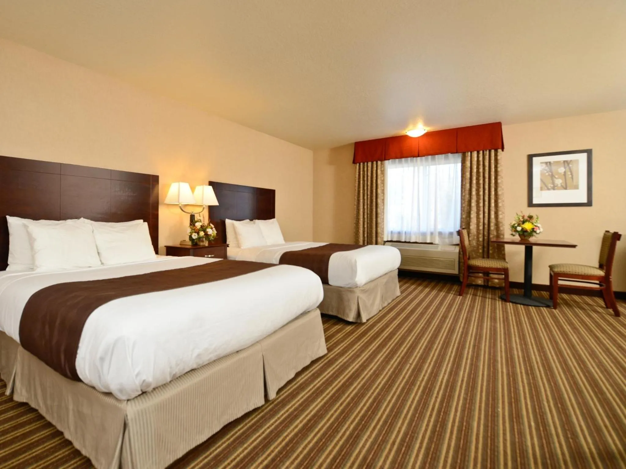 Bed in Yellowstone West Gate Hotel