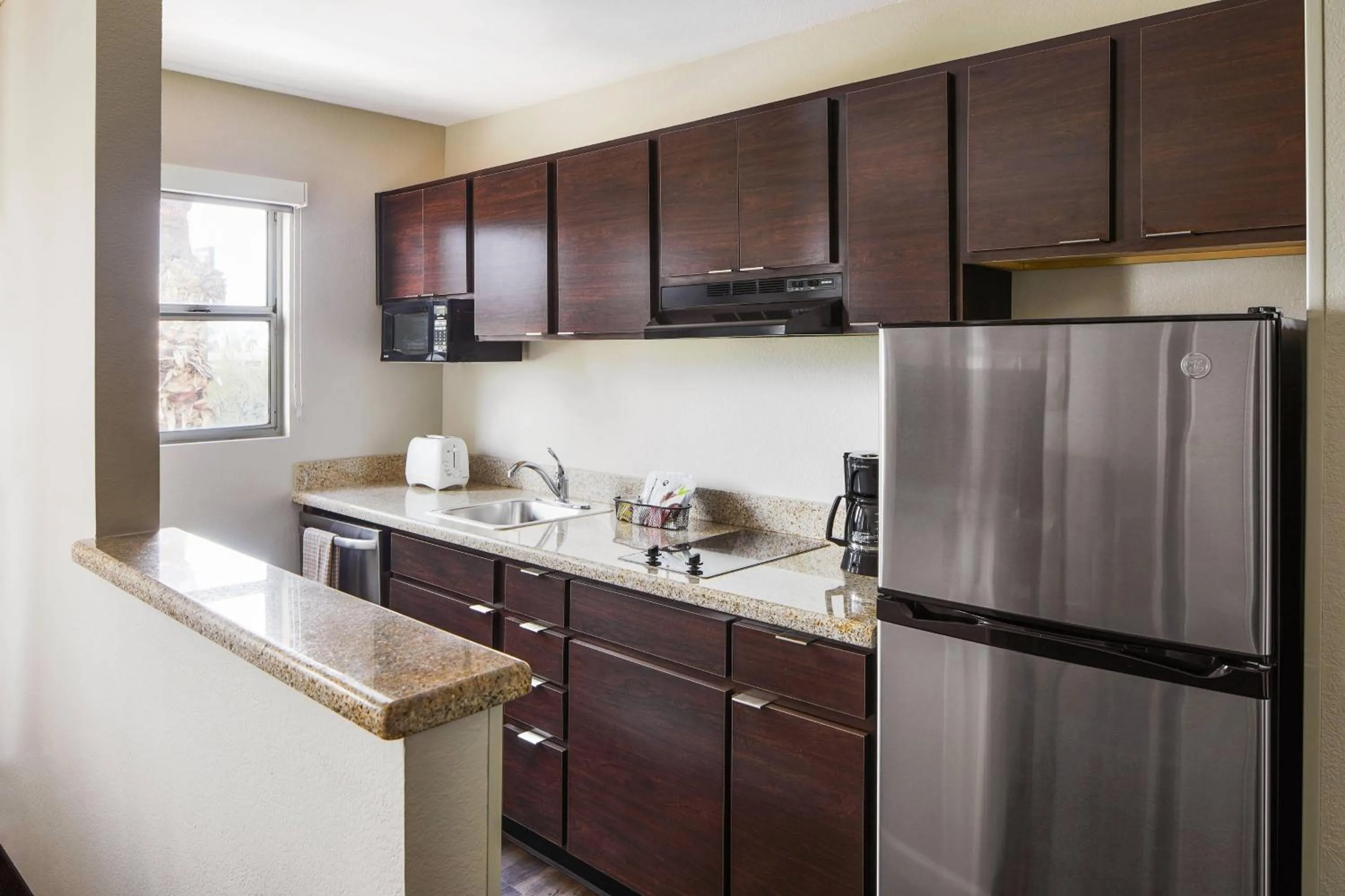 Kitchen or kitchenette in TownePlace Suites Tempe at Arizona Mills Mall